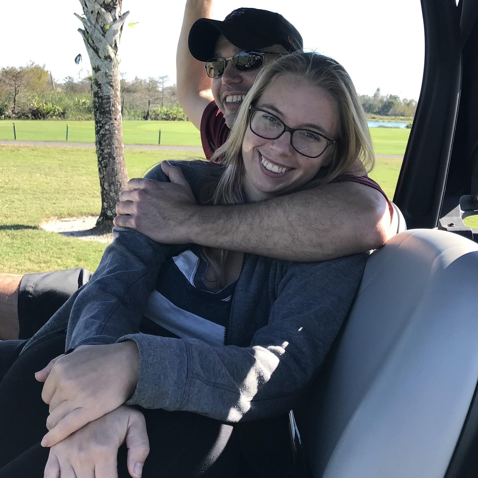 Mary’s way better driving a cart than a golf ball.