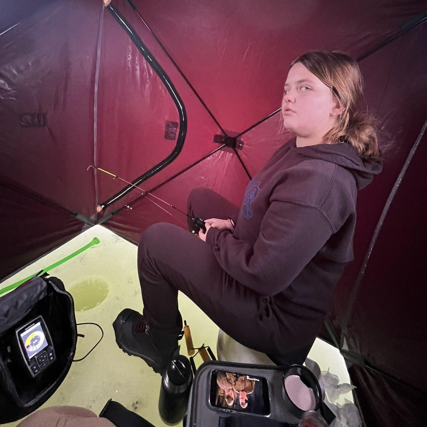 Ice fishing.... With a movie, heat, hot chocolate, & snacks. Guess this is how you ice fish in the modern days????