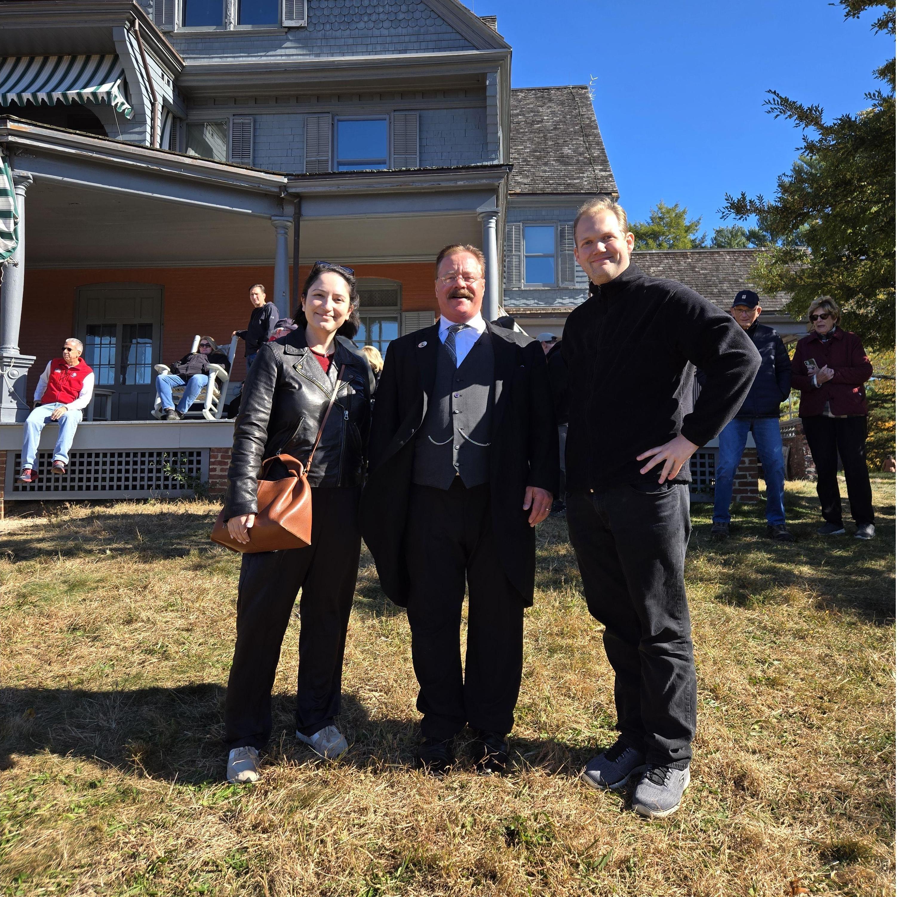 With a Theodore Roosevelt performer (Joe Wiegand) at Sagamore Hill. Almost 6 months later to the day, the proposal happened on that porch.