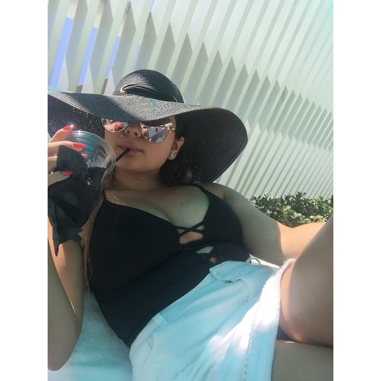 Relaxing poolside on her "Birthday"