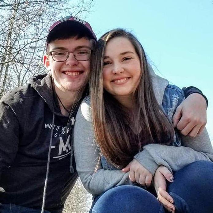 Photo shoot with phone propped up on abandoned train tracks. We look young!