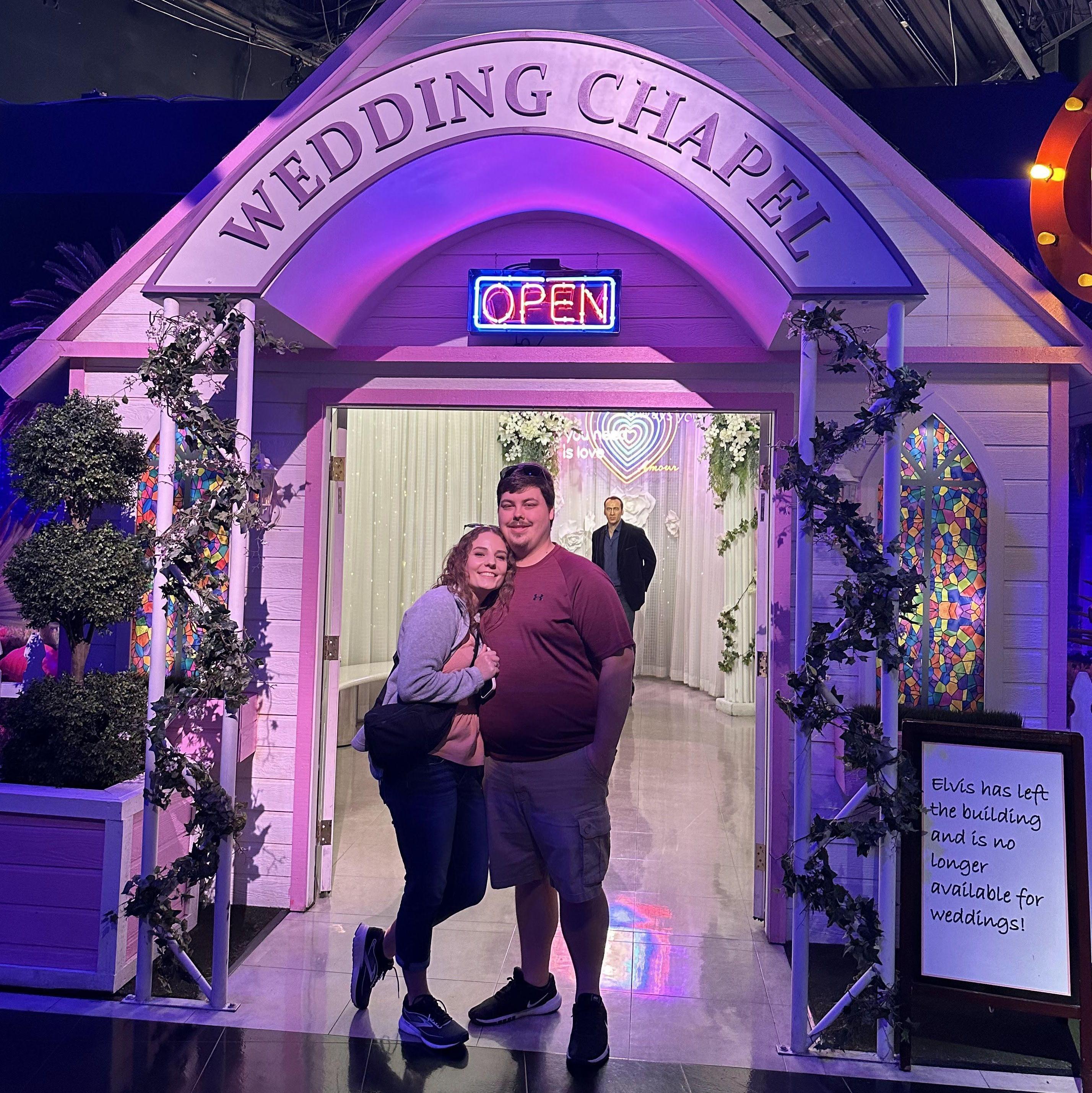 2024 - We sent our family members a picture in front of a wedding chapel when we were in Las Vegas! This was only 5 months before we got engaged!