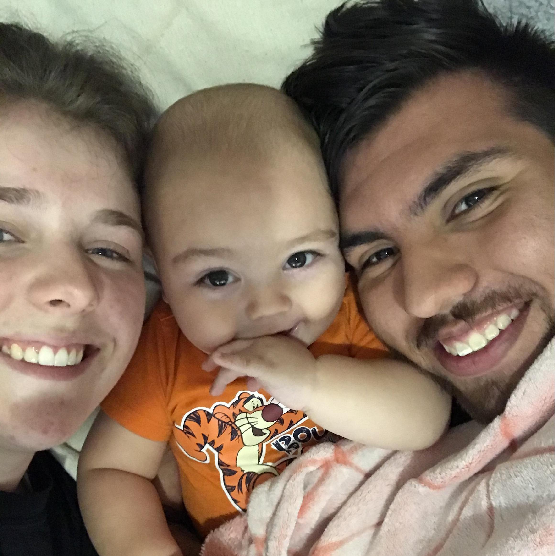 Cuddles with our nephew, Ezrah in August 2020