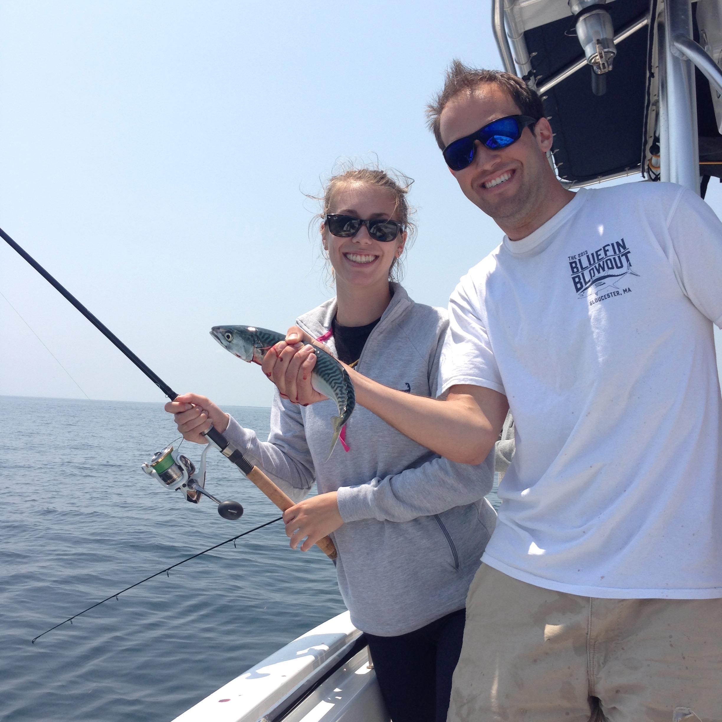 Chris teaching Marissa how to fish (successfully!) on the Cape