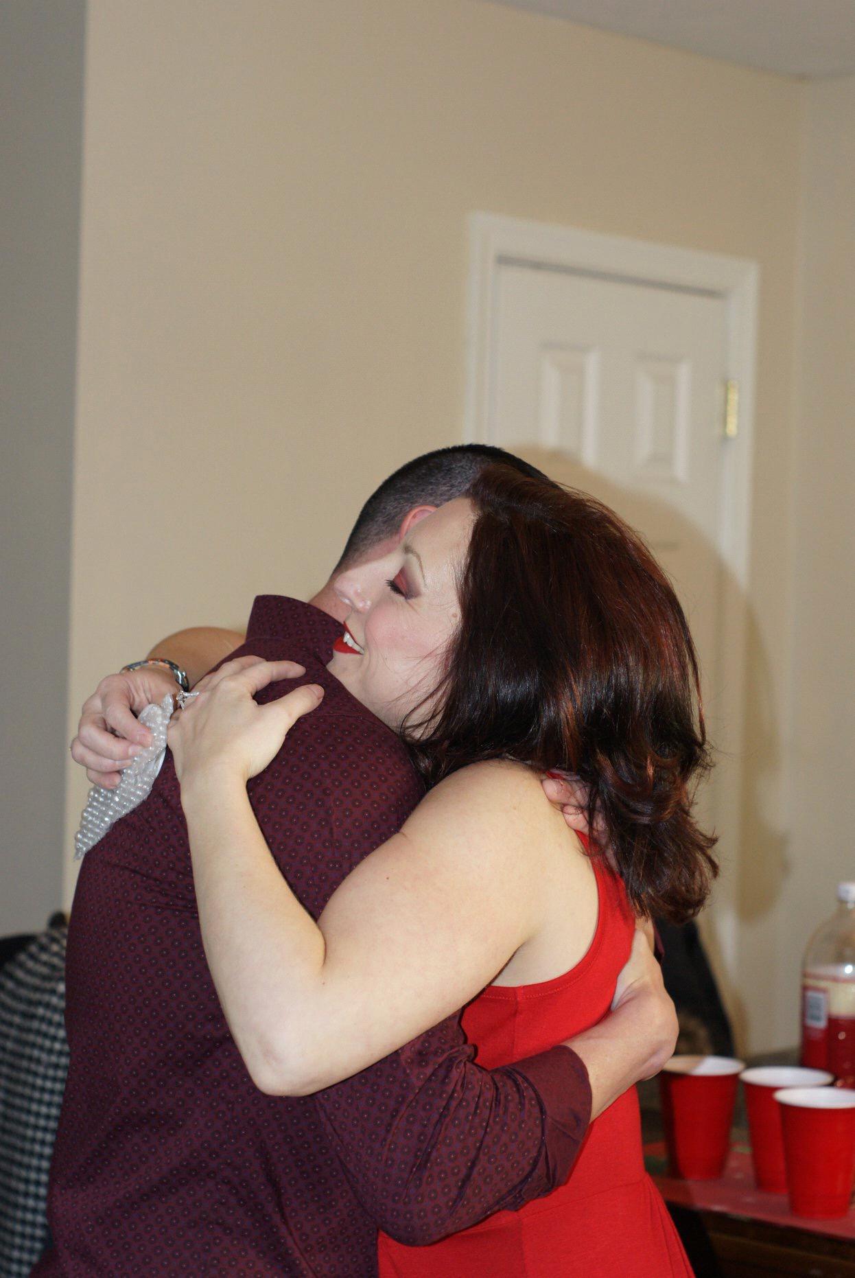 First embrace as an engaged couple.