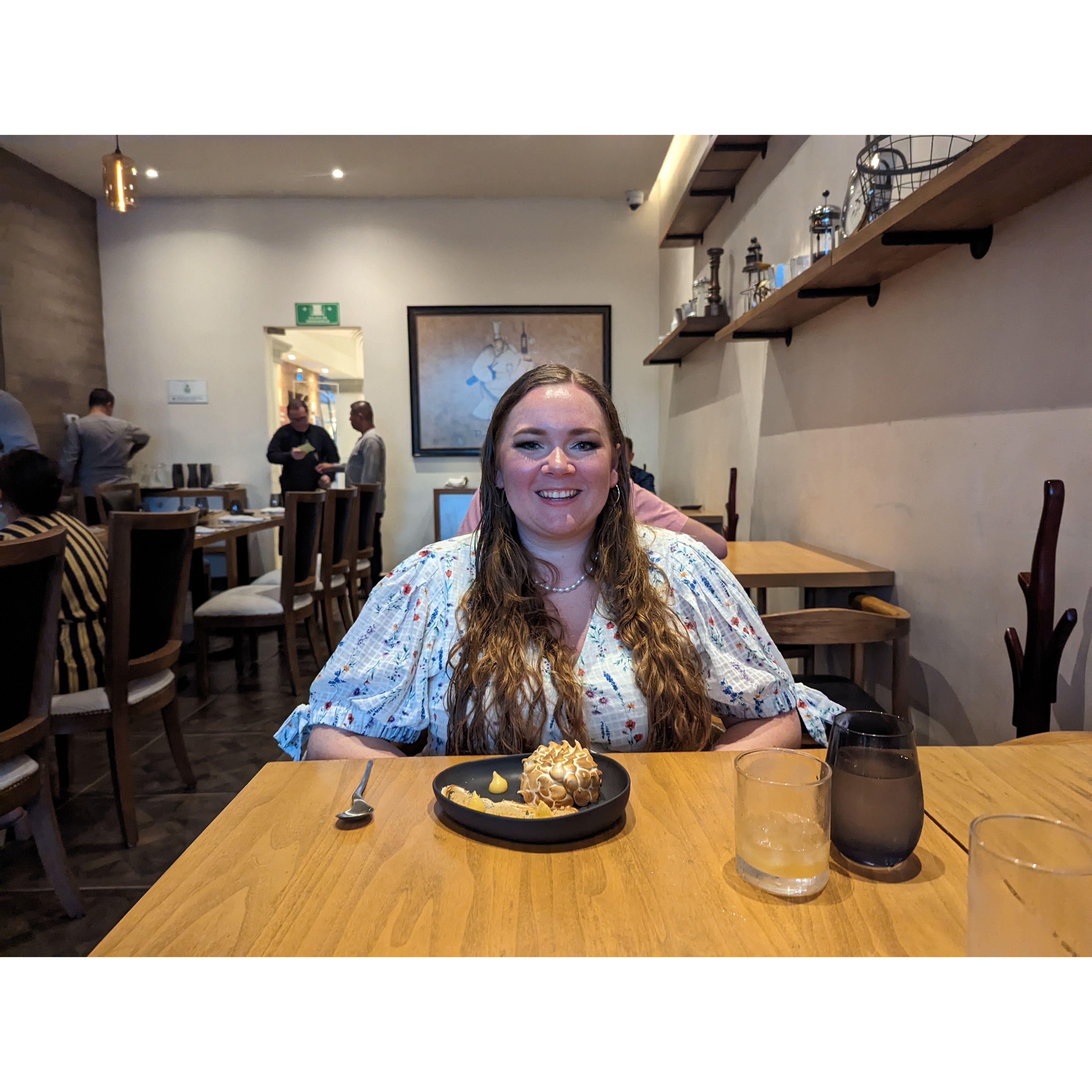 Tori at dinner, having no idea that she would be engaged less than an hour later.