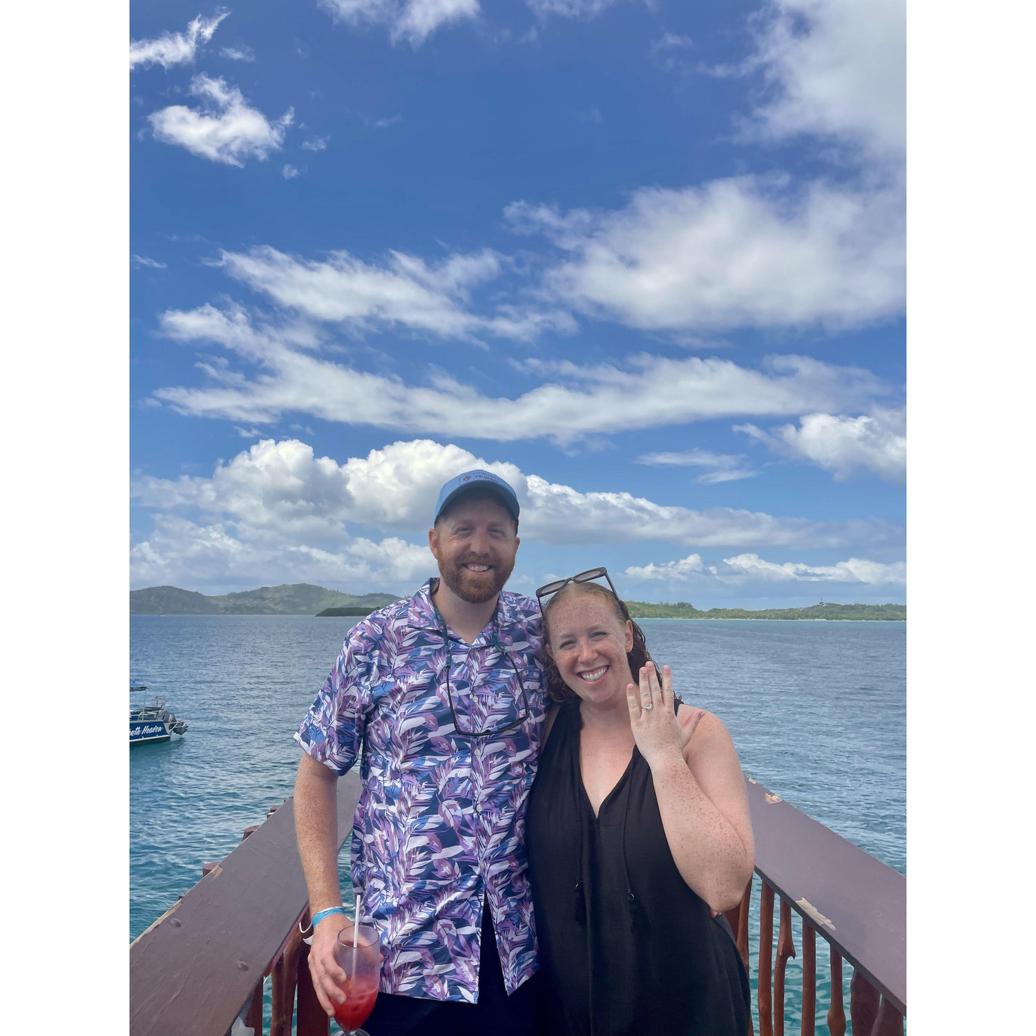 Celebrating in paradise after she said yes!