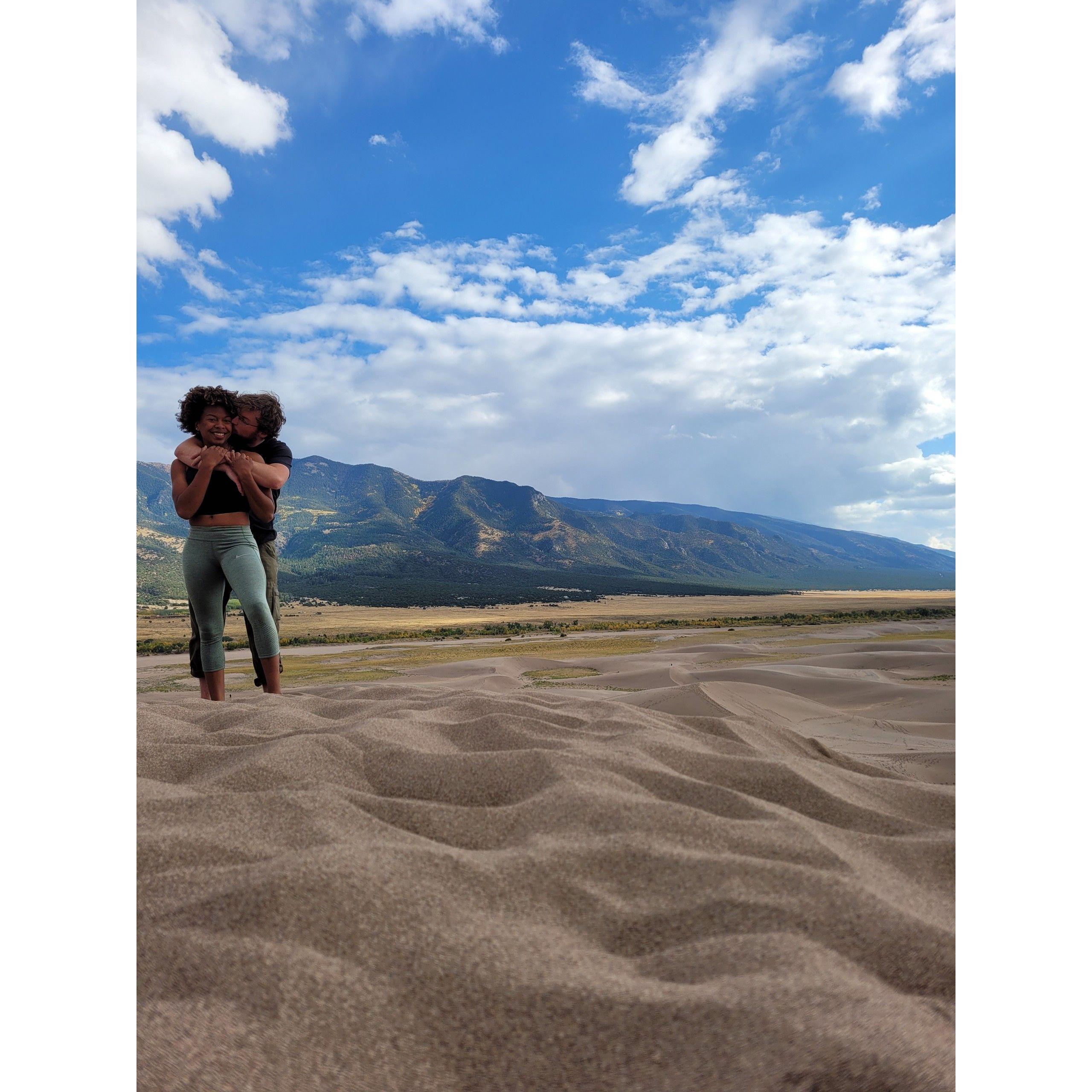 Scaling the great sand dunes, CO.