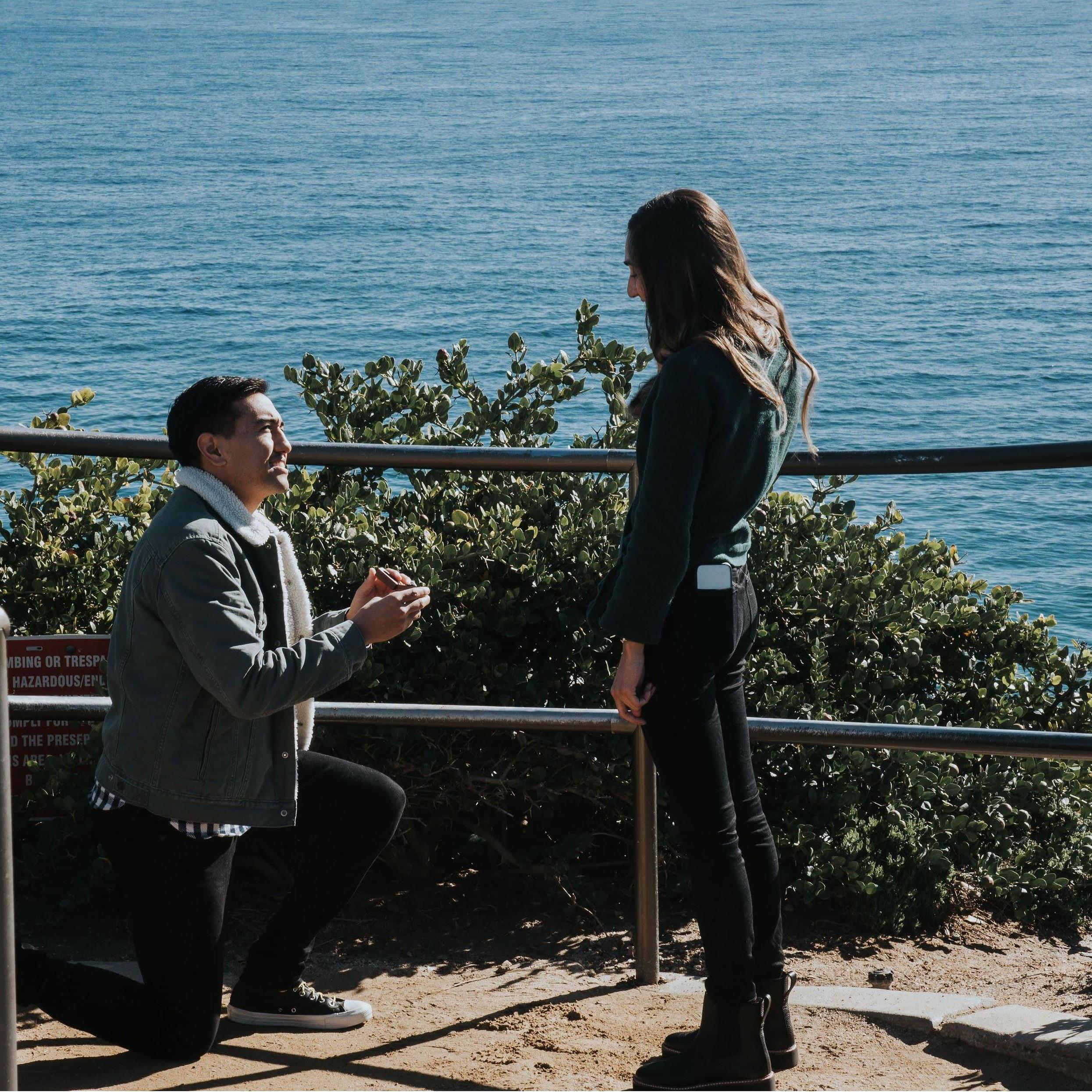 Aaron proposing at Crescent Bay in Laguna Beach.