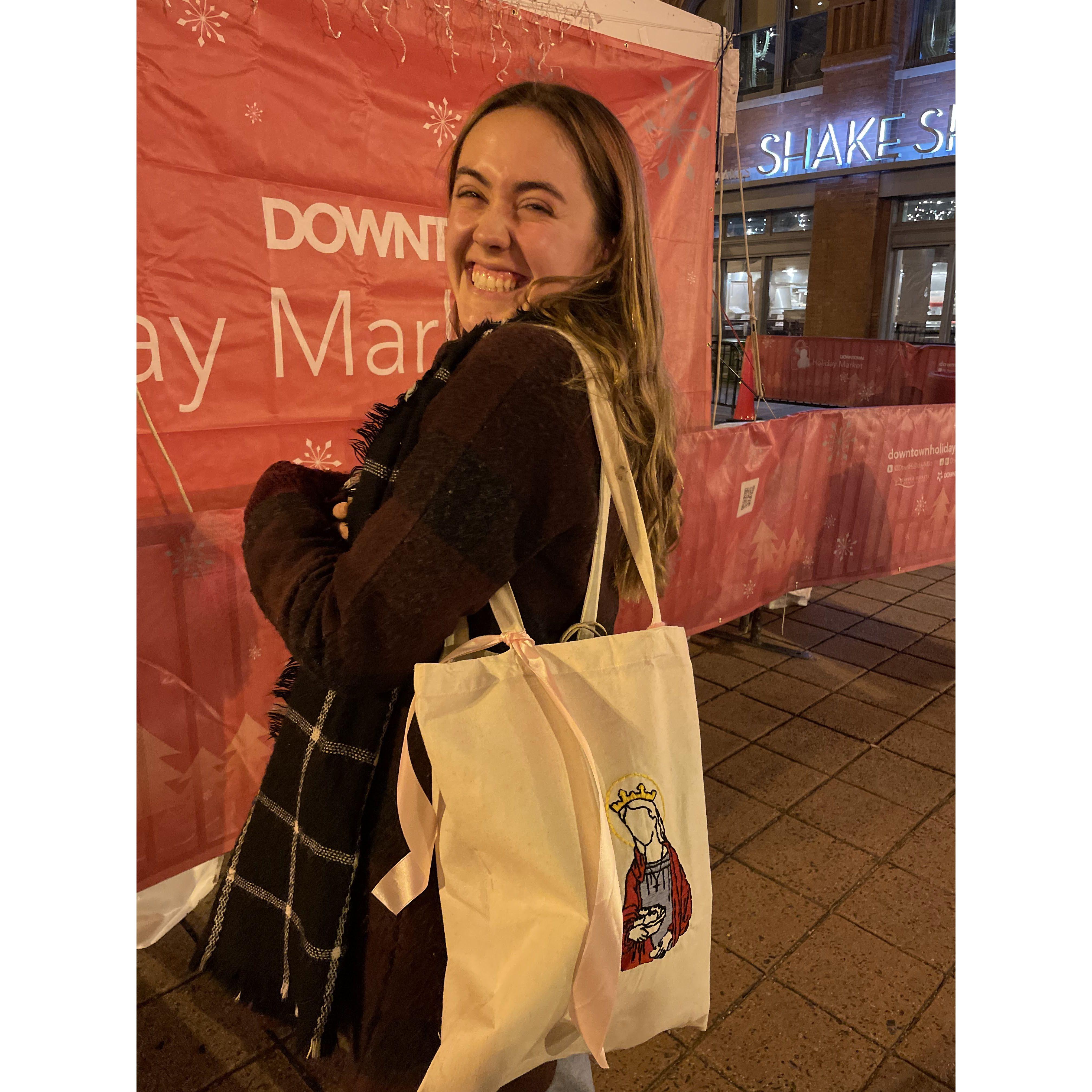 Lizzie rocking her St. Elizabeth of Hungary tote