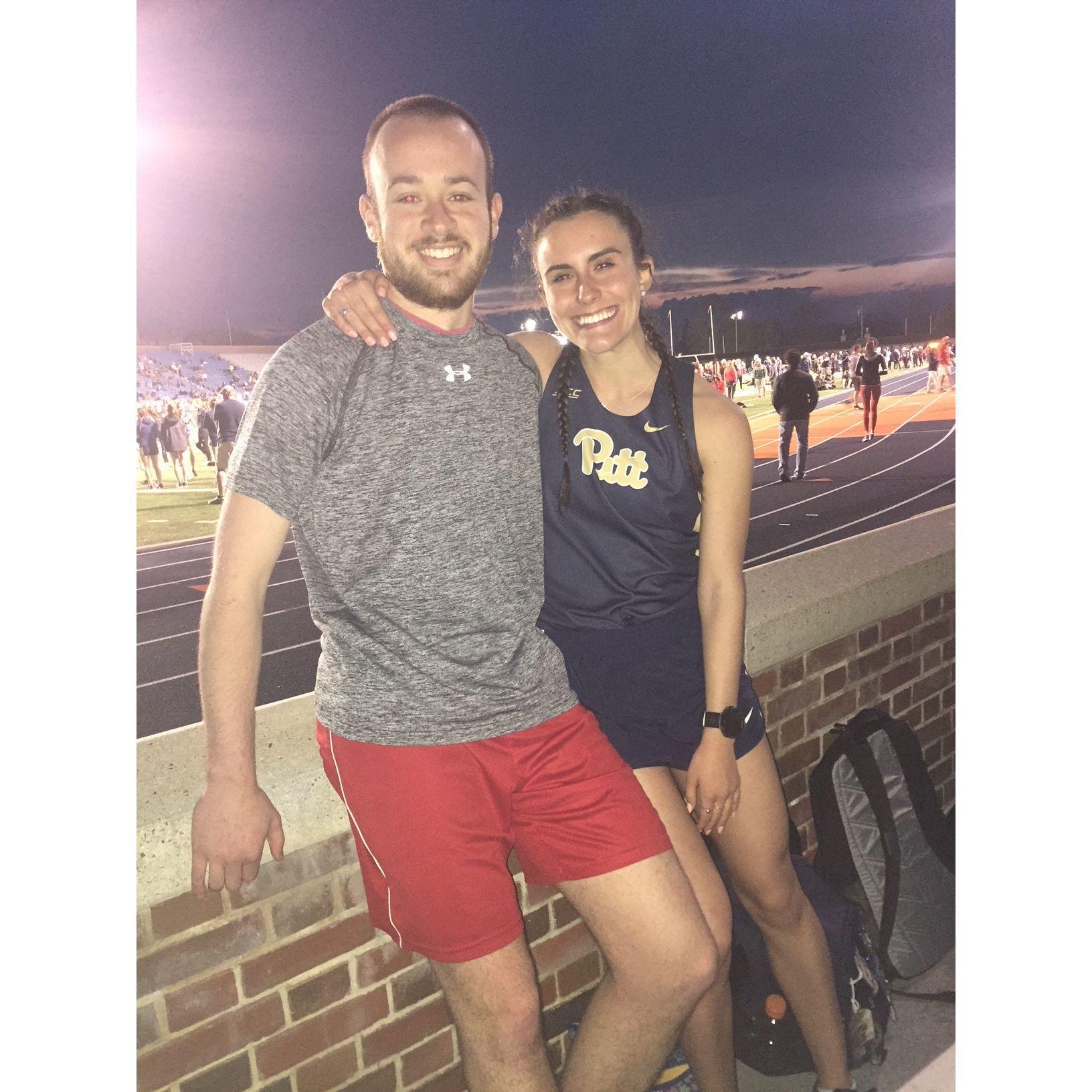 Chris supporting Emily at one of her final college track meets.