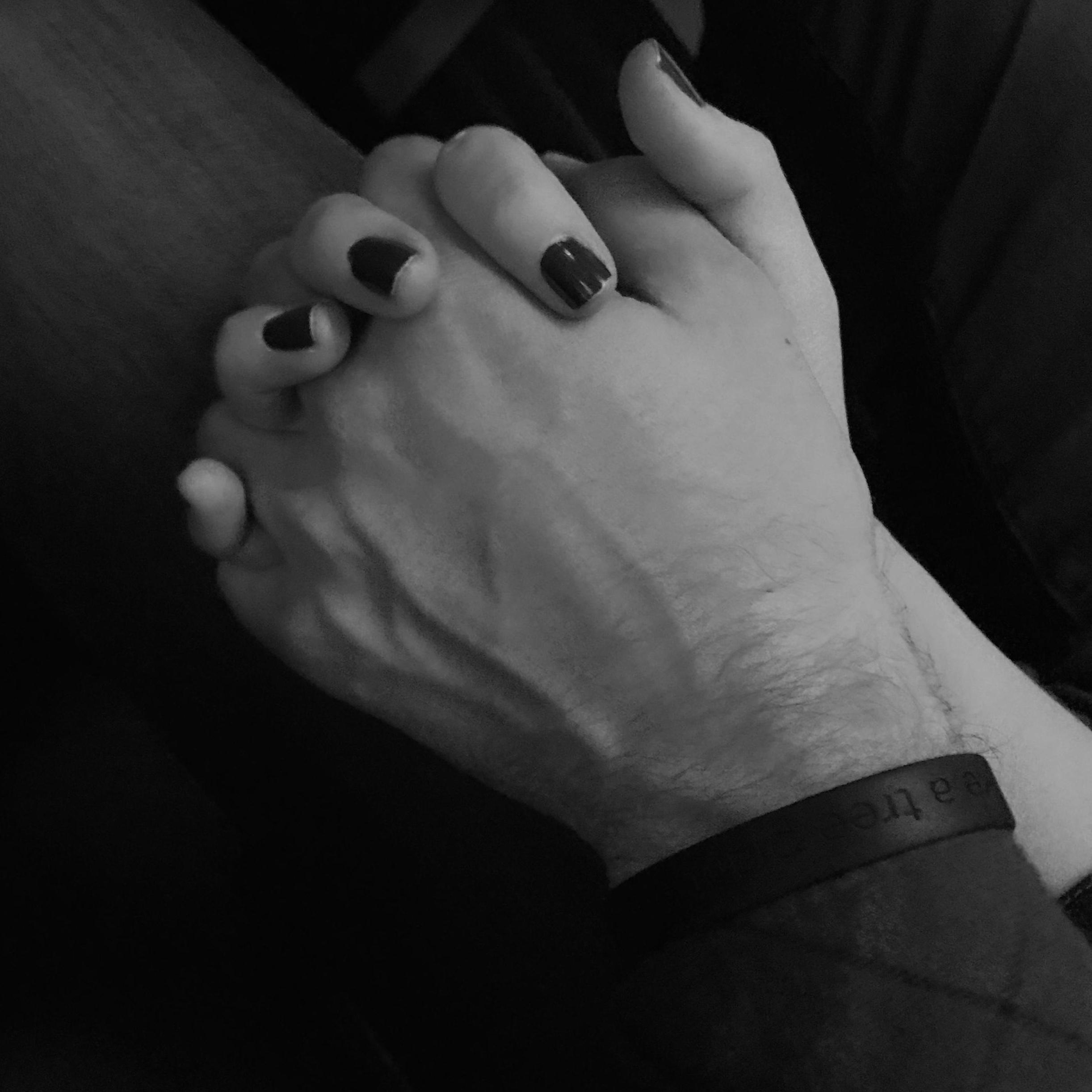 Holding hands during take off on a flight to Wisconsin