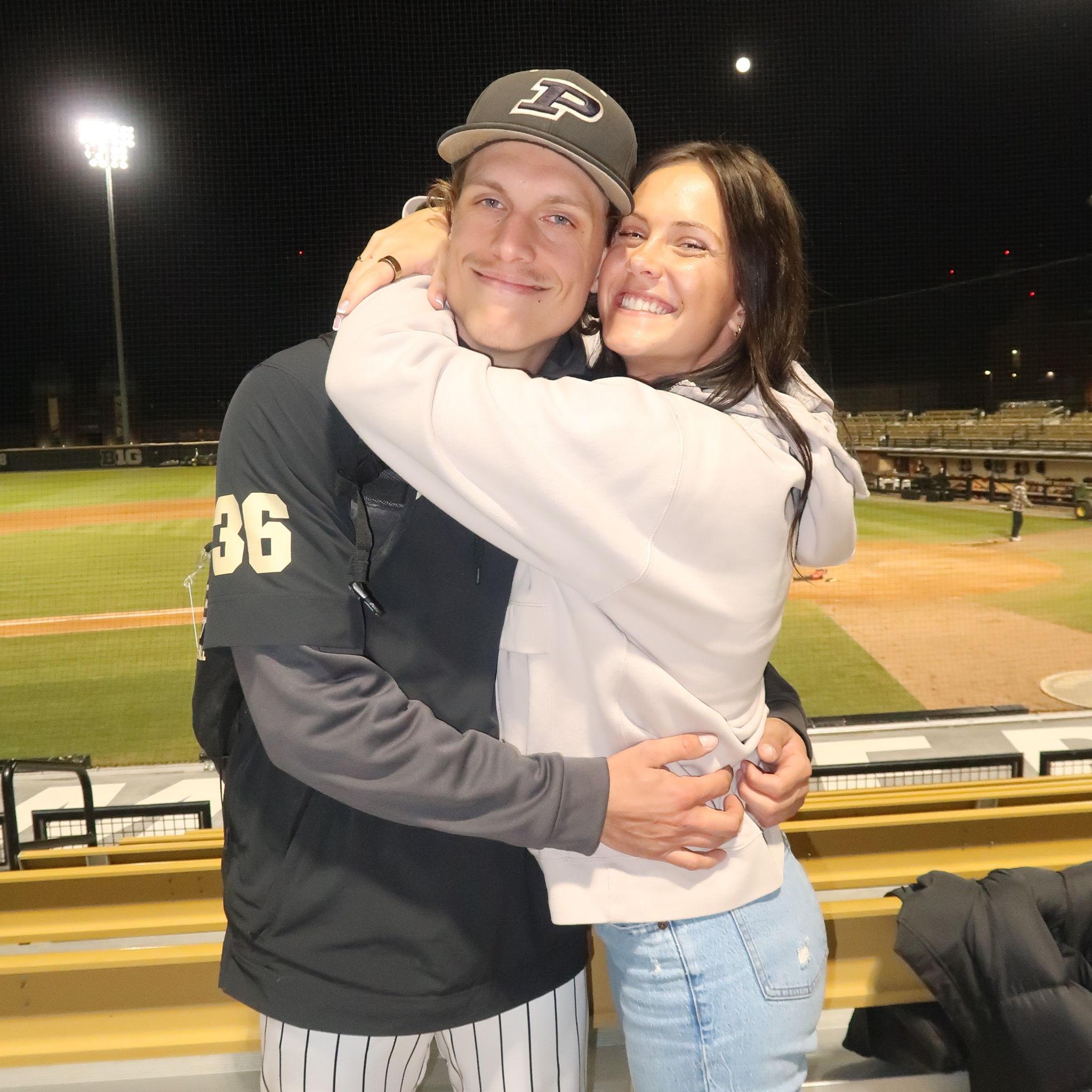 Madison supporting Carter in baseball.