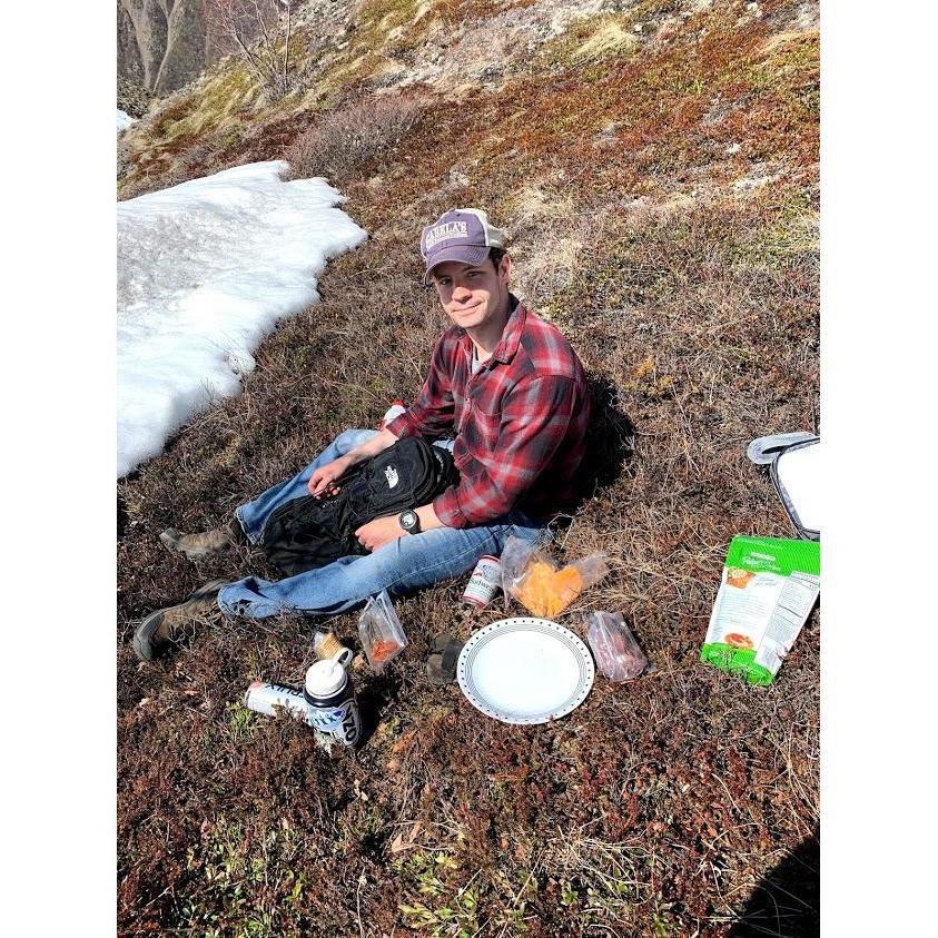 We packed a picnic lunch that we ate after our engagement! It was May but there was still snow at the top of the mountain.