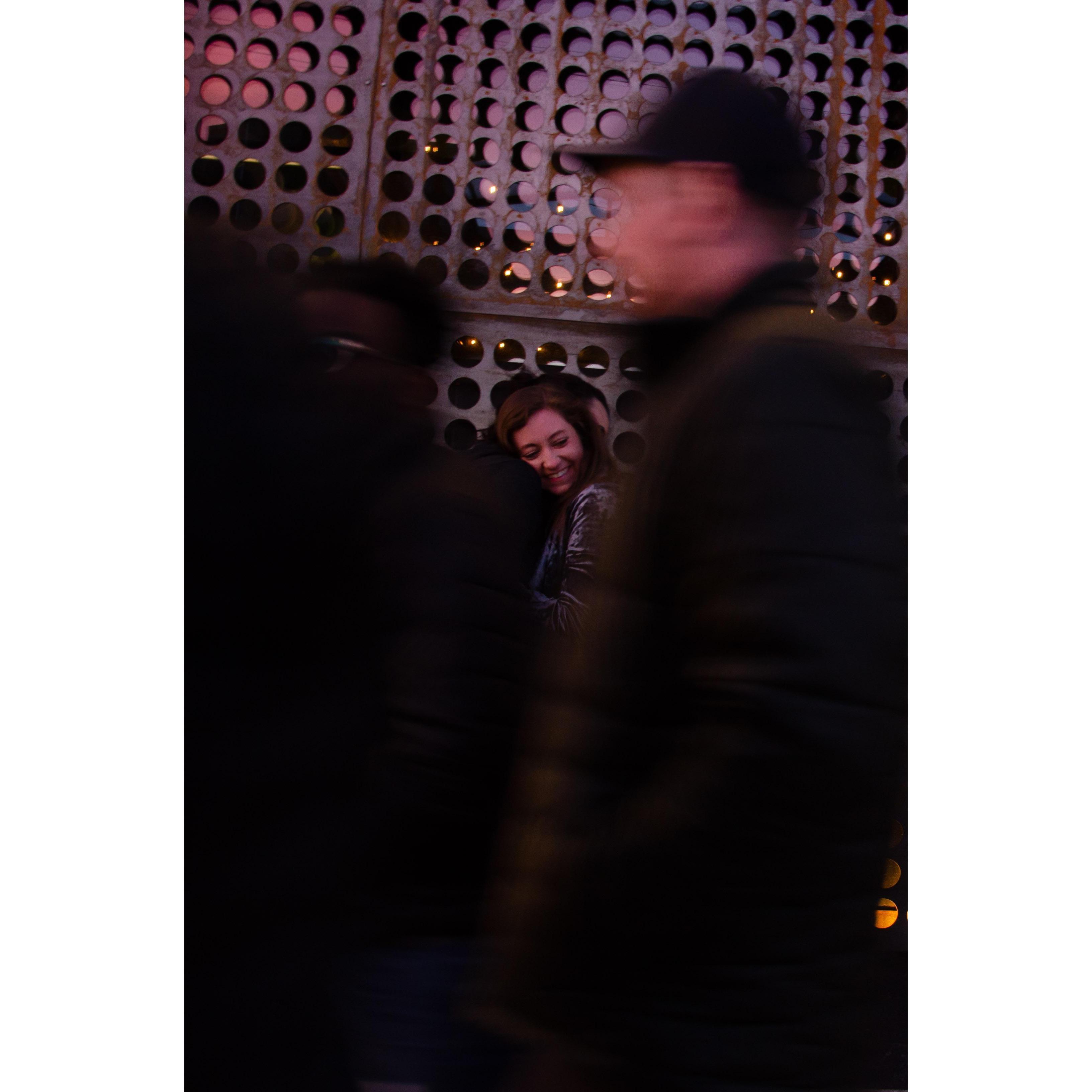 Through the crowd.