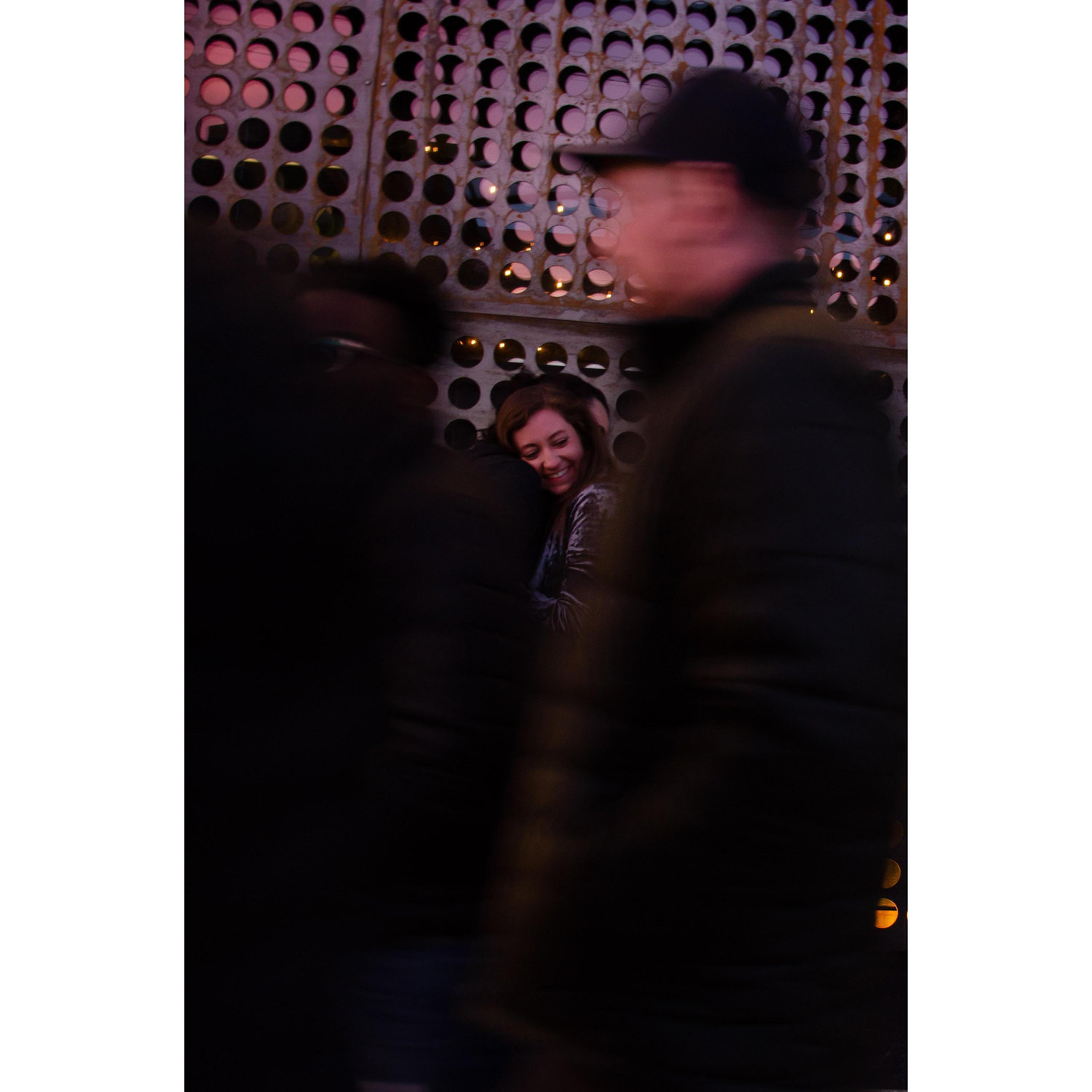 Through the crowd.