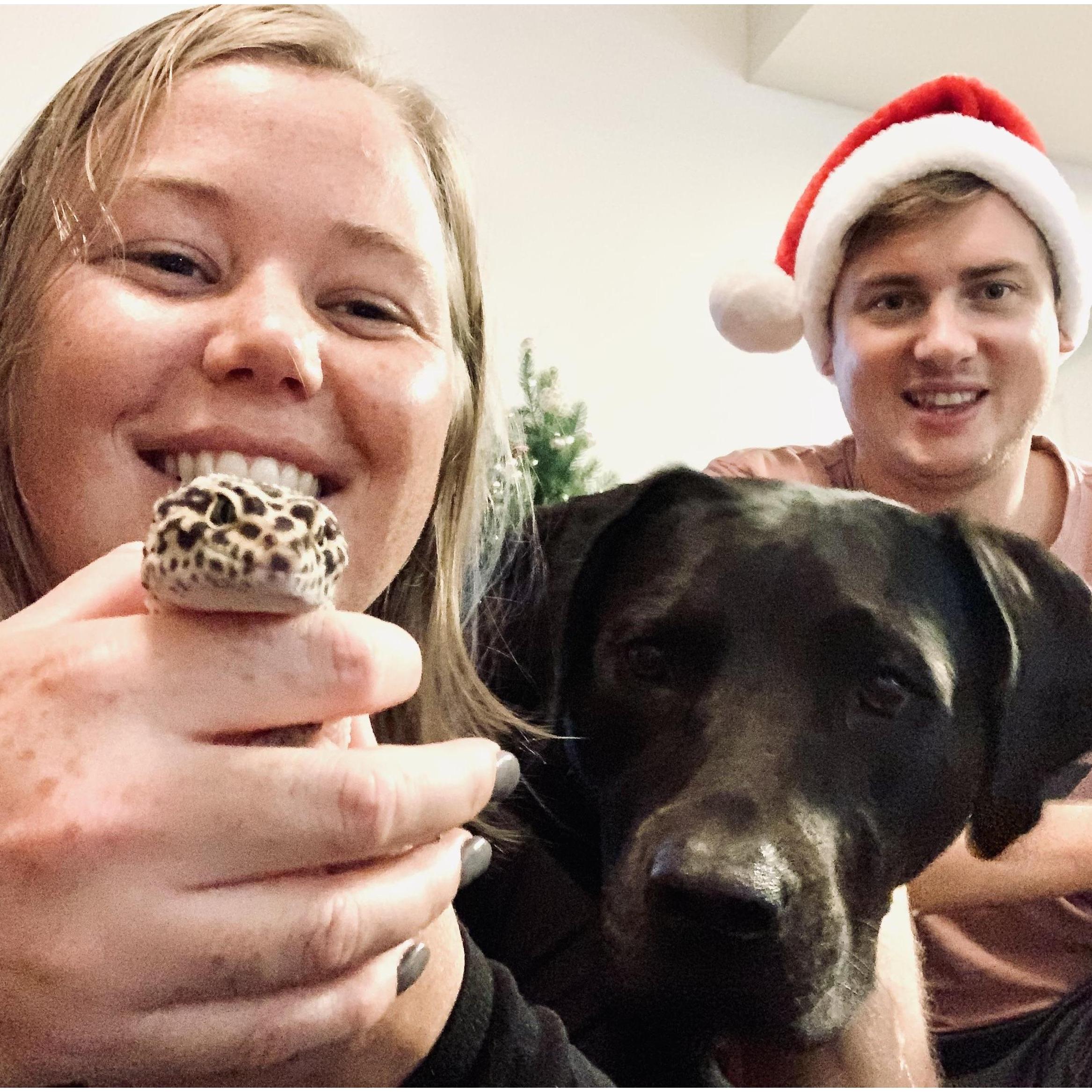 First time we got the whole family in one photo! Lola, our sassy lab, is five years young. Nestled in Shannon's hand is their leopard gecko, Pico de Gecko.