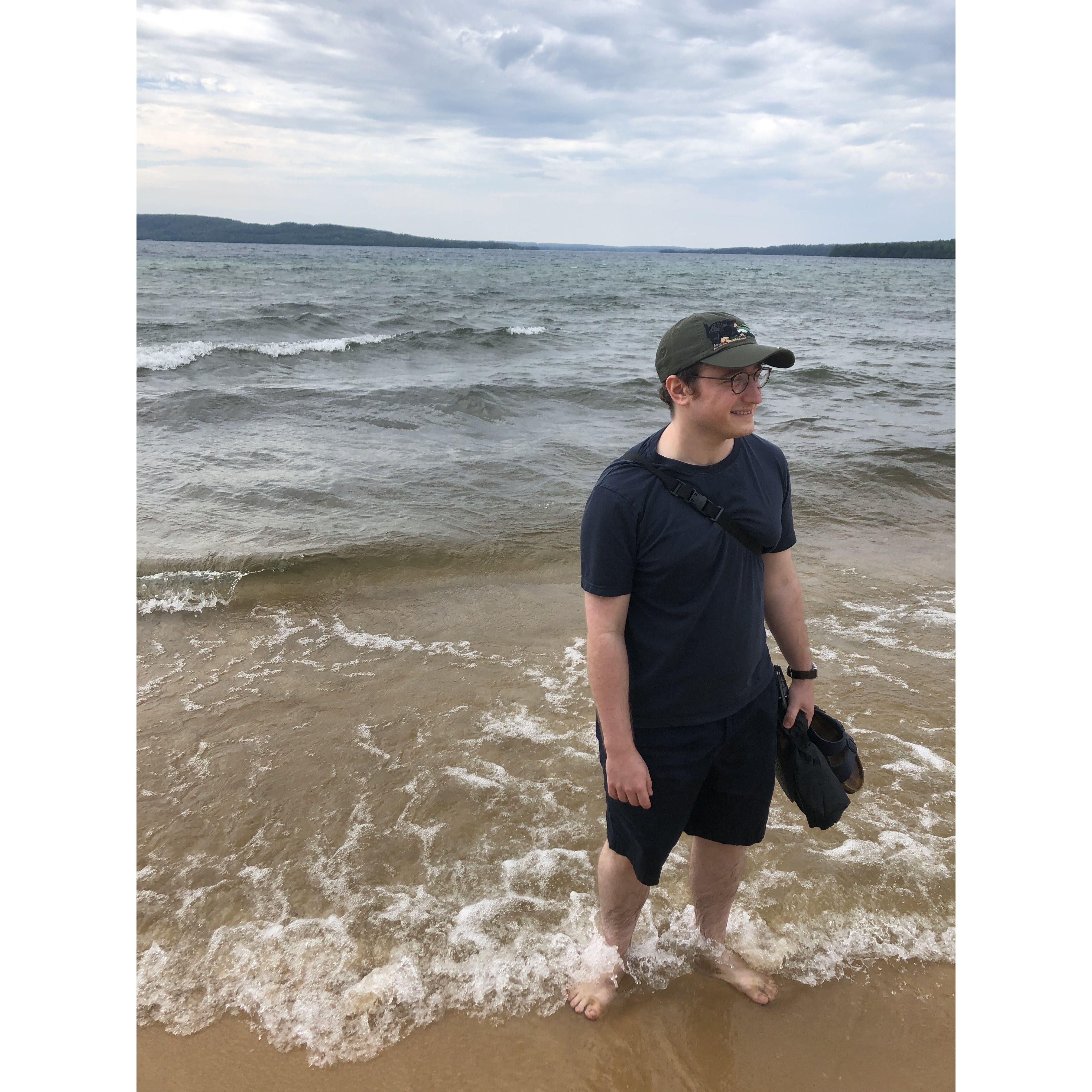We loved exploring the Great Lakes when we lived in Chicago. In 2019, we took a road trip to the Upper Peninsula of Michigan. Here is Alex in Lake Superior.