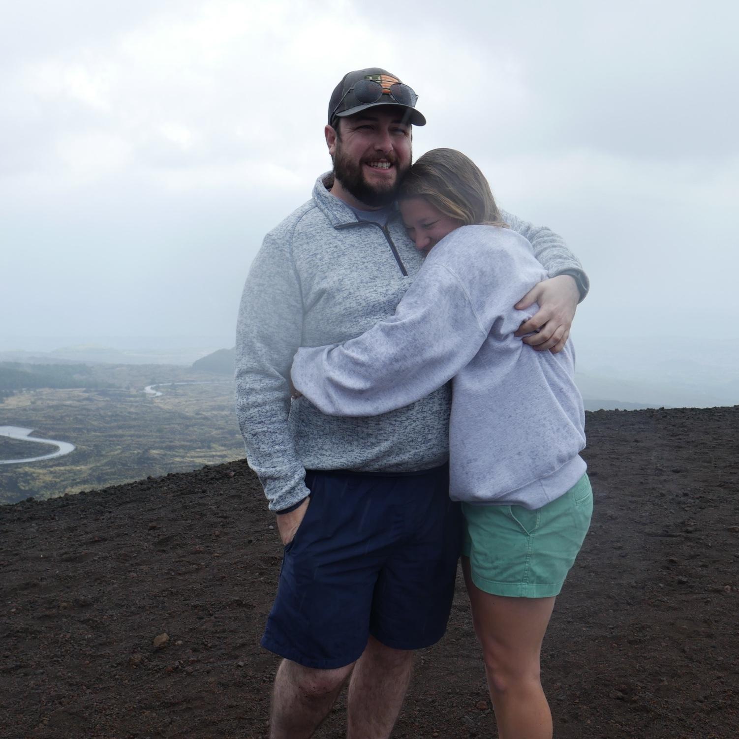 JT proposed in Italy on top of an active volcano, Mount Etna! It was raining, but it couldn’t have been more perfect!
