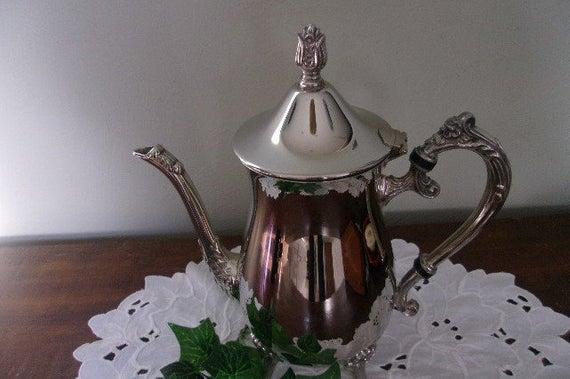 Vintage Silver Plated Teapot Ornate Handle Spout 4 Small Legs W Floral Medallions Floral Finial May Be Gold Washed Inside Serving Tea Party