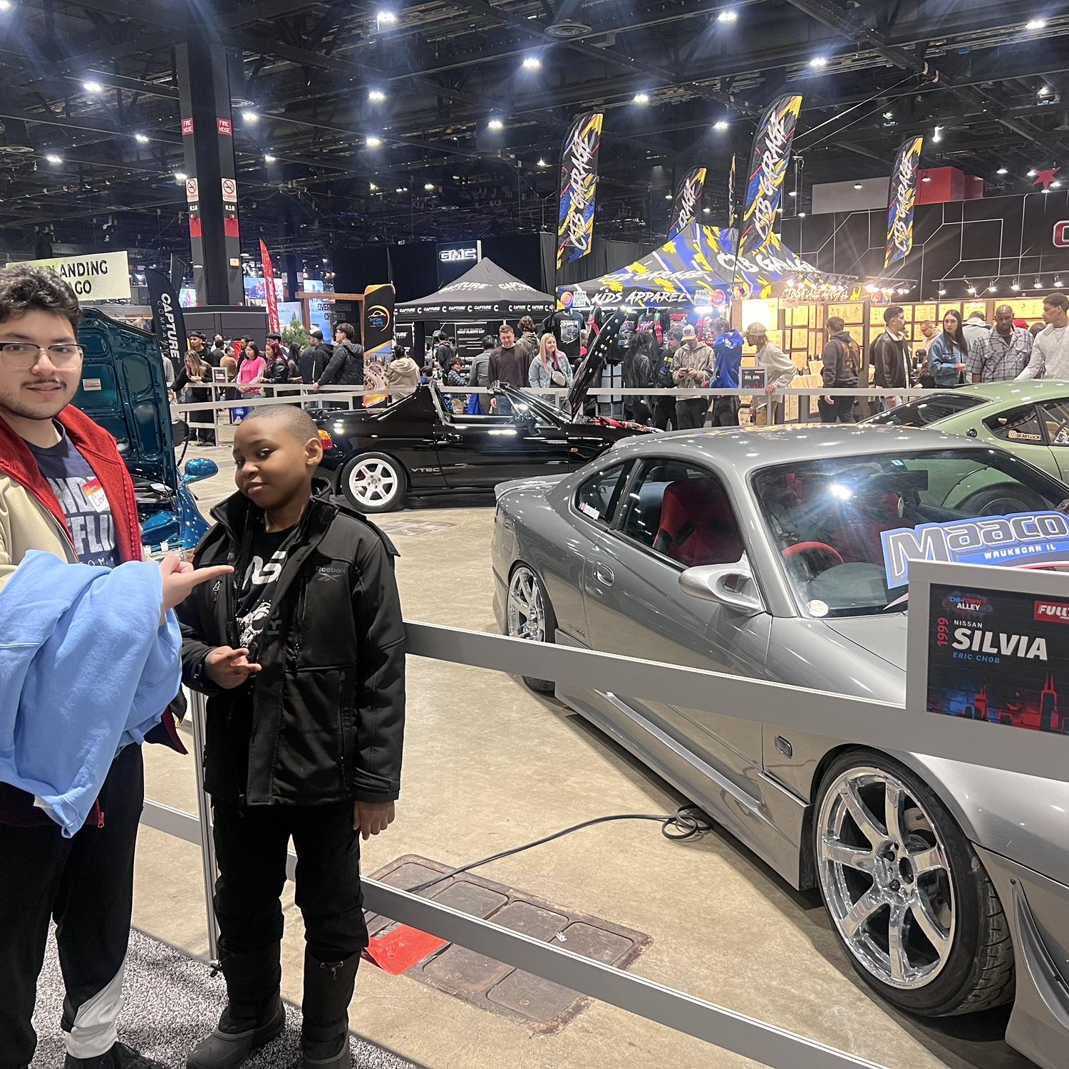 Cosme and Naimah’s little brother at Auto Show