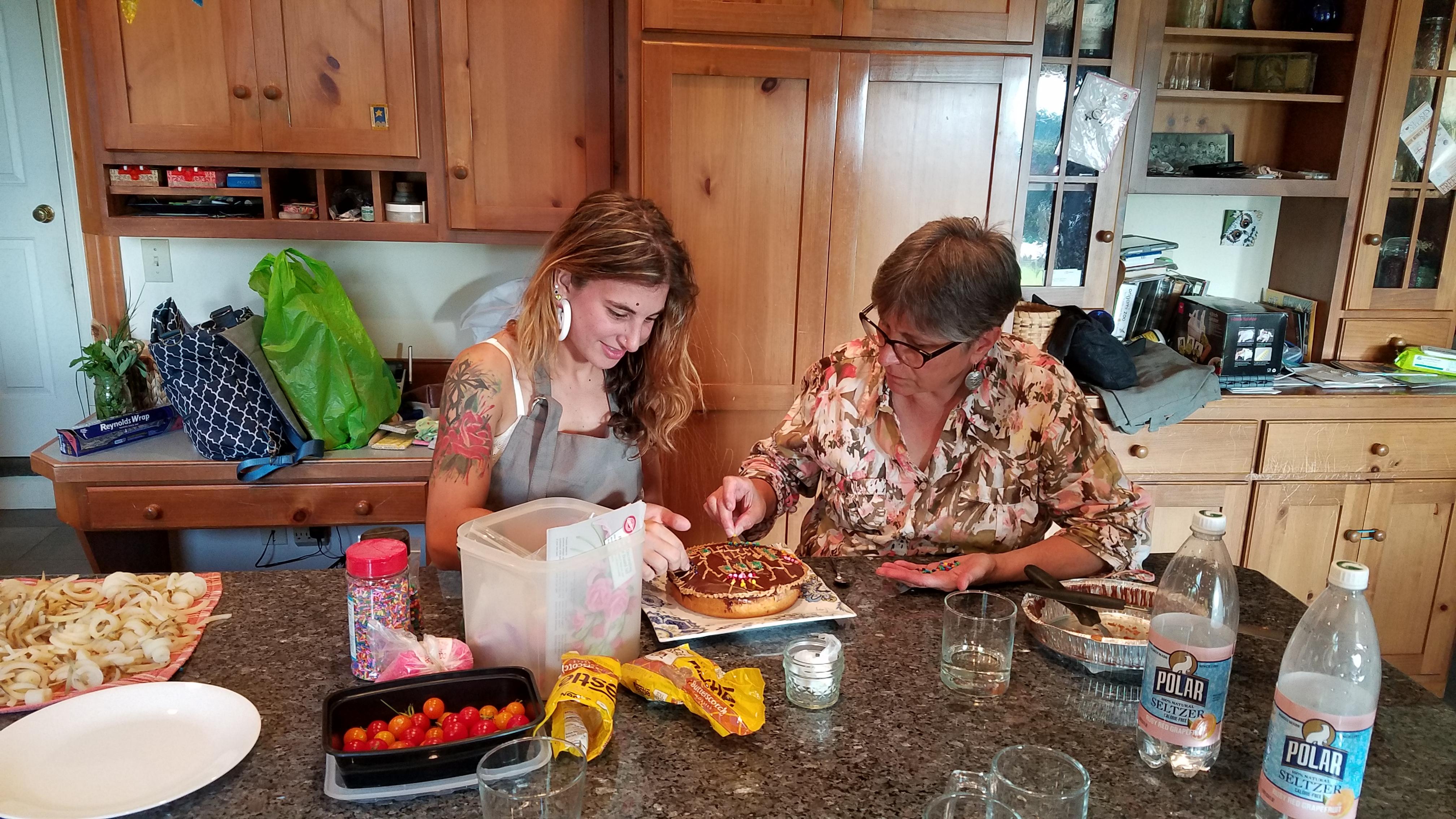 Dani spending some quality time with momma Springer (Sue). They were decorating a cake for someones birthday.