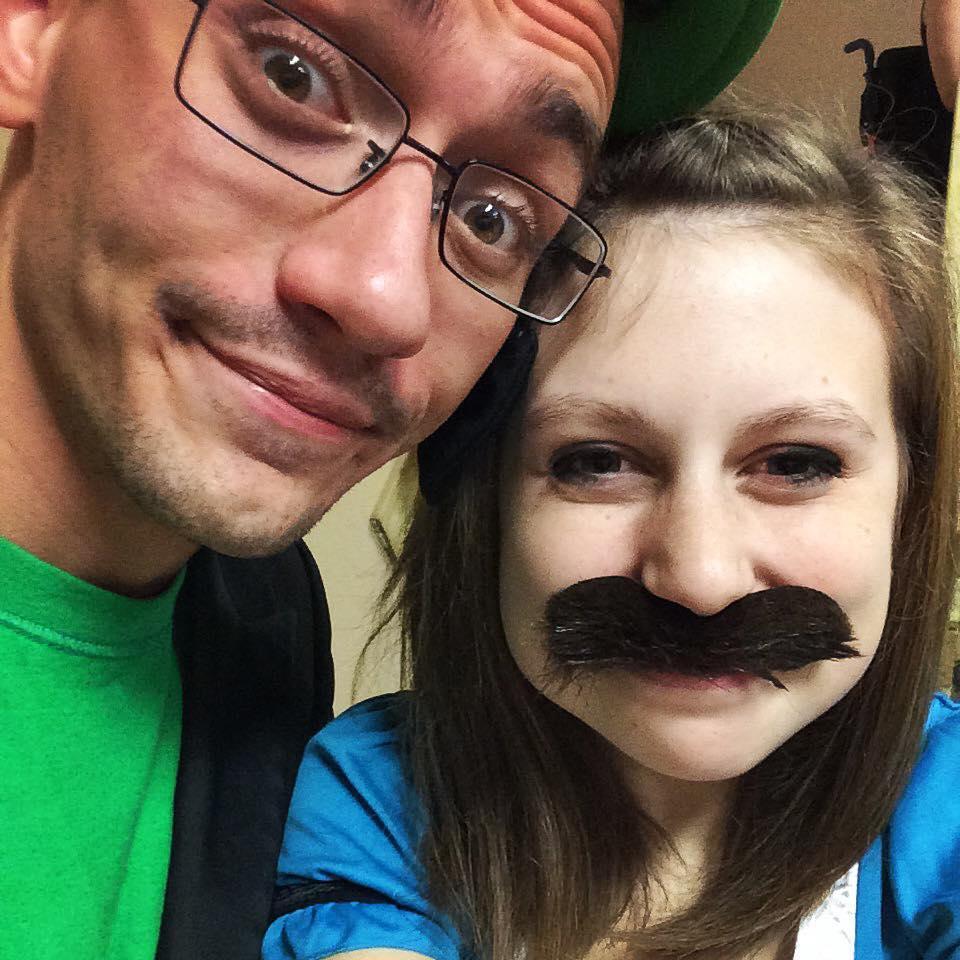 This is the first picture we posted on social media together. We were at a Halloween party in 2014 I was Alice in Wonderland and Derek was Luigi, but I guess I decided his mustache looked better on me