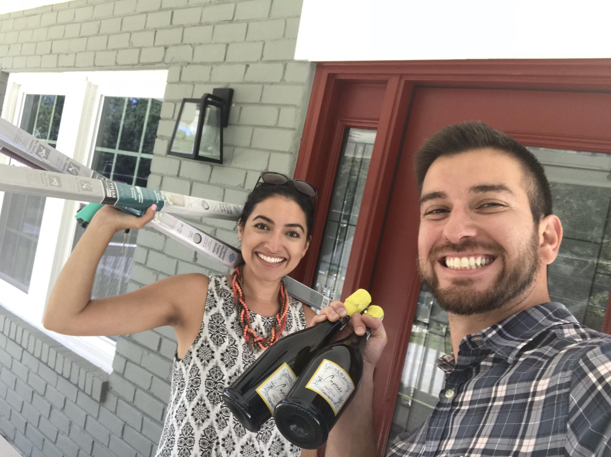 First house purchases after closing on our house...champagne & paper blinds!