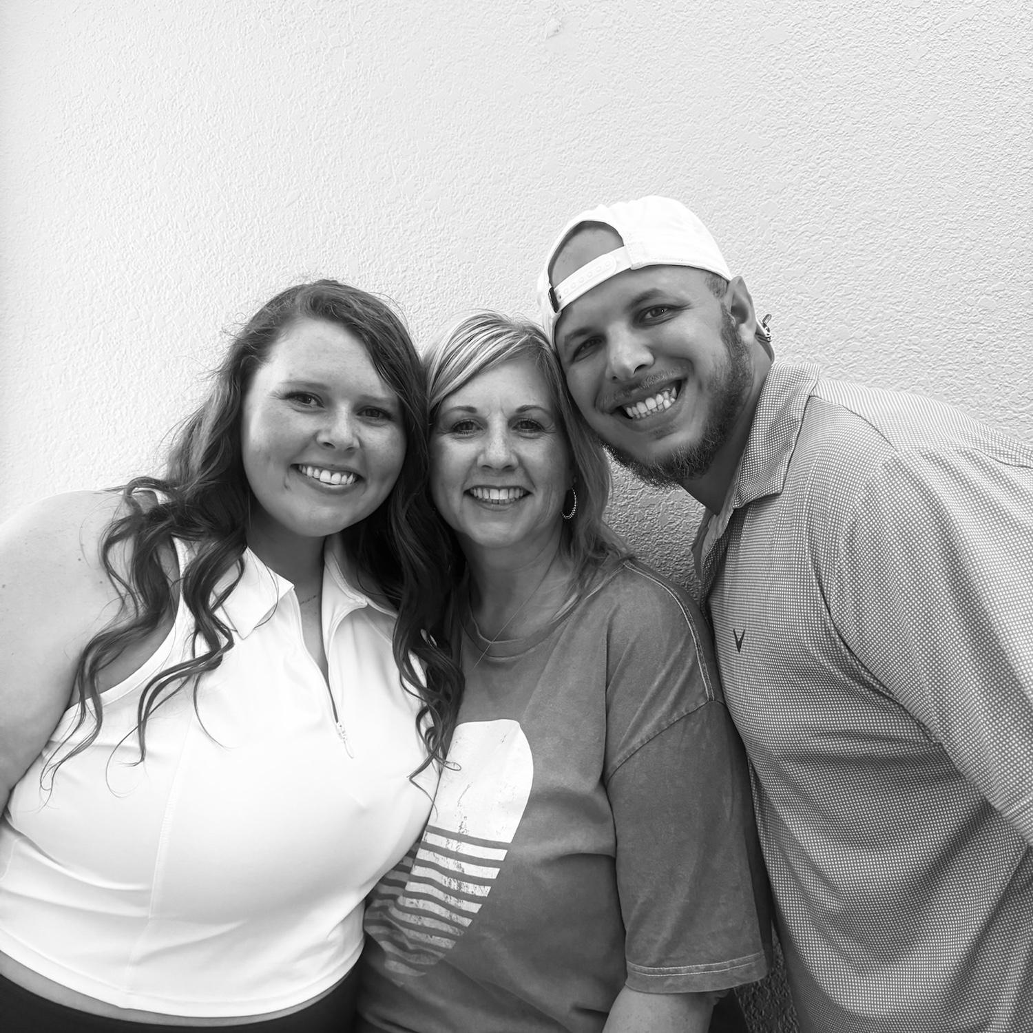 Posing with Brooke’s mom after she shot our save the date photos