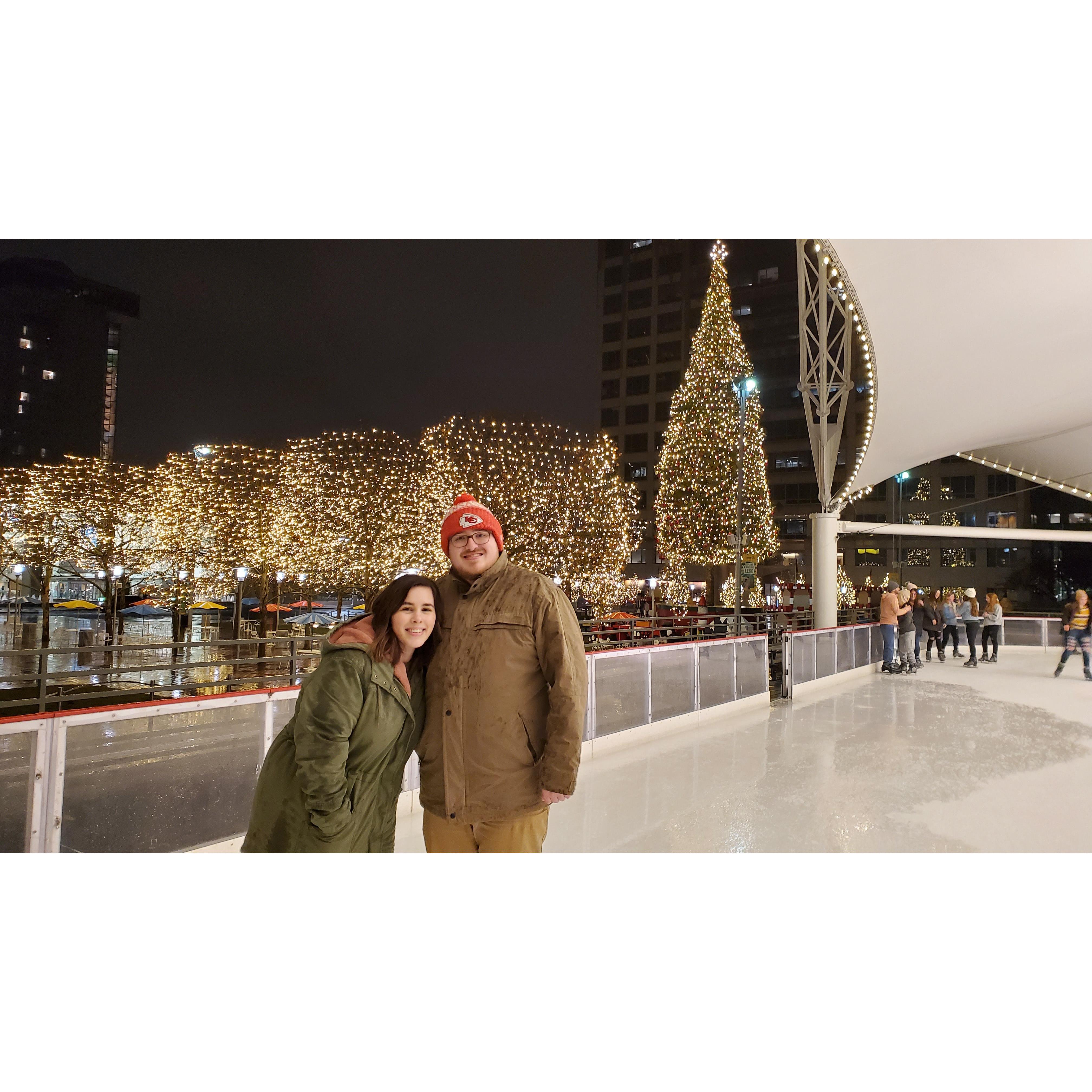Attempting to ice skate with friends.