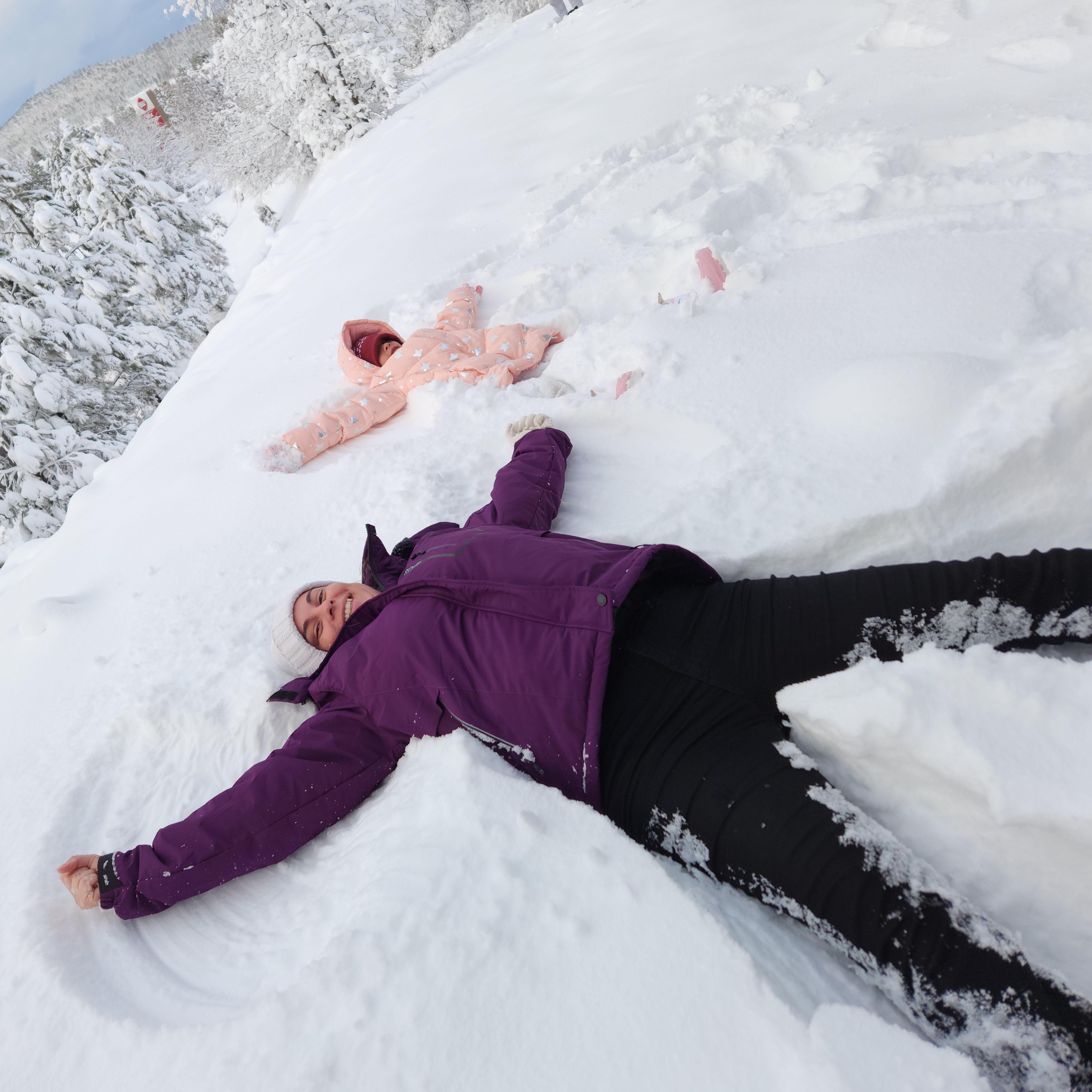 Snow angels with Mariah and Irene!