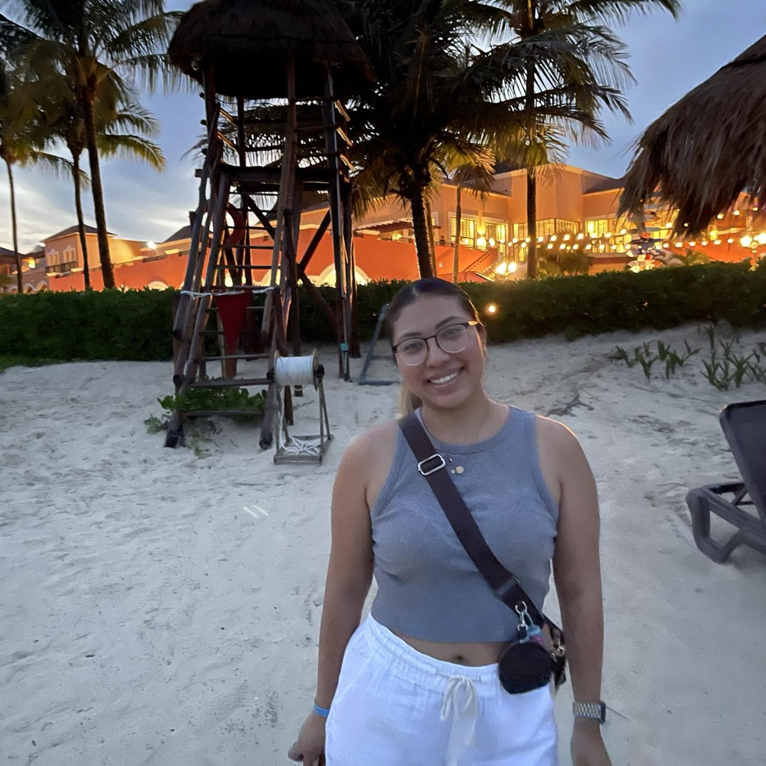 Stepping on the beach near our hotel in Cancun