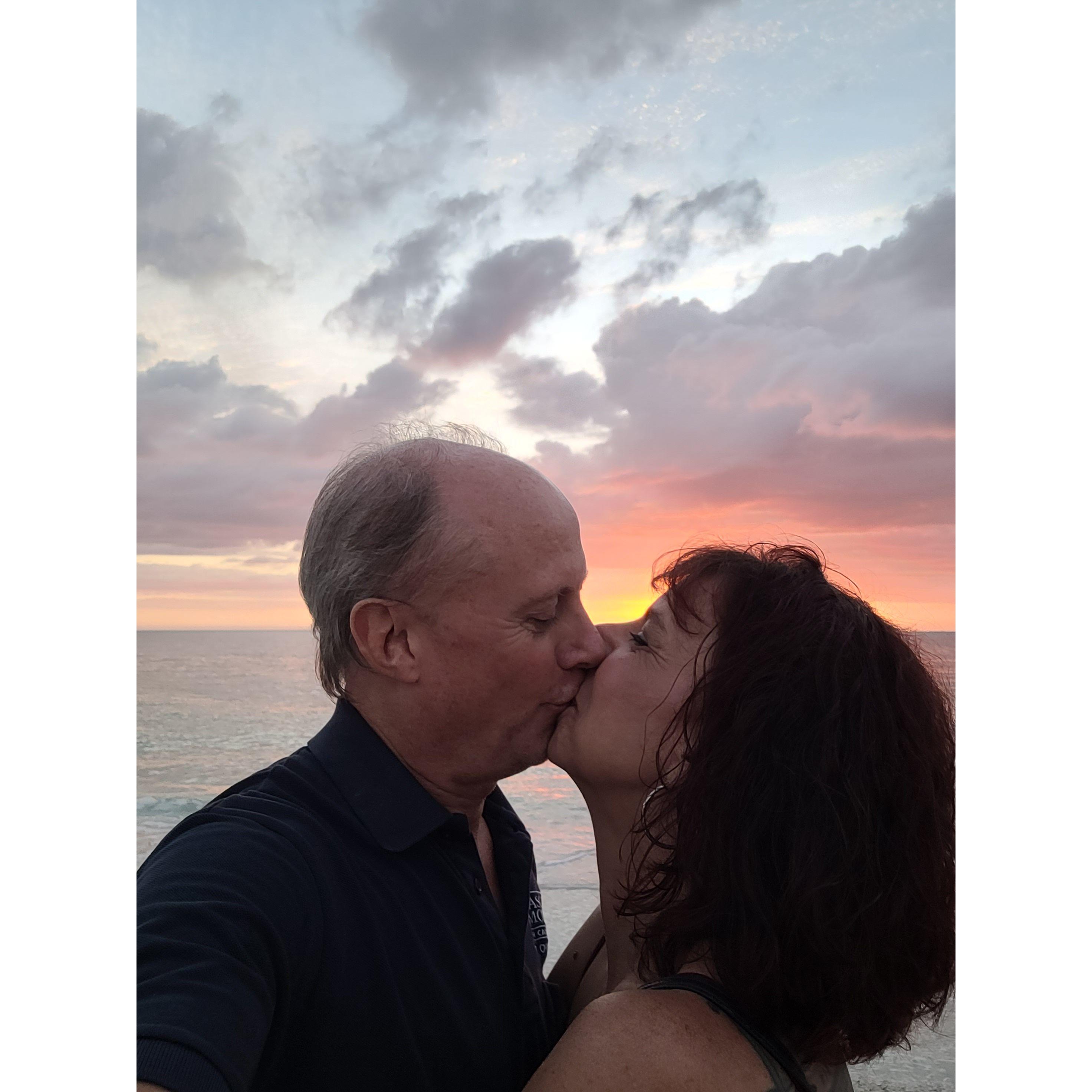 Nothing says I Love You like kissing on the beach during sunset
