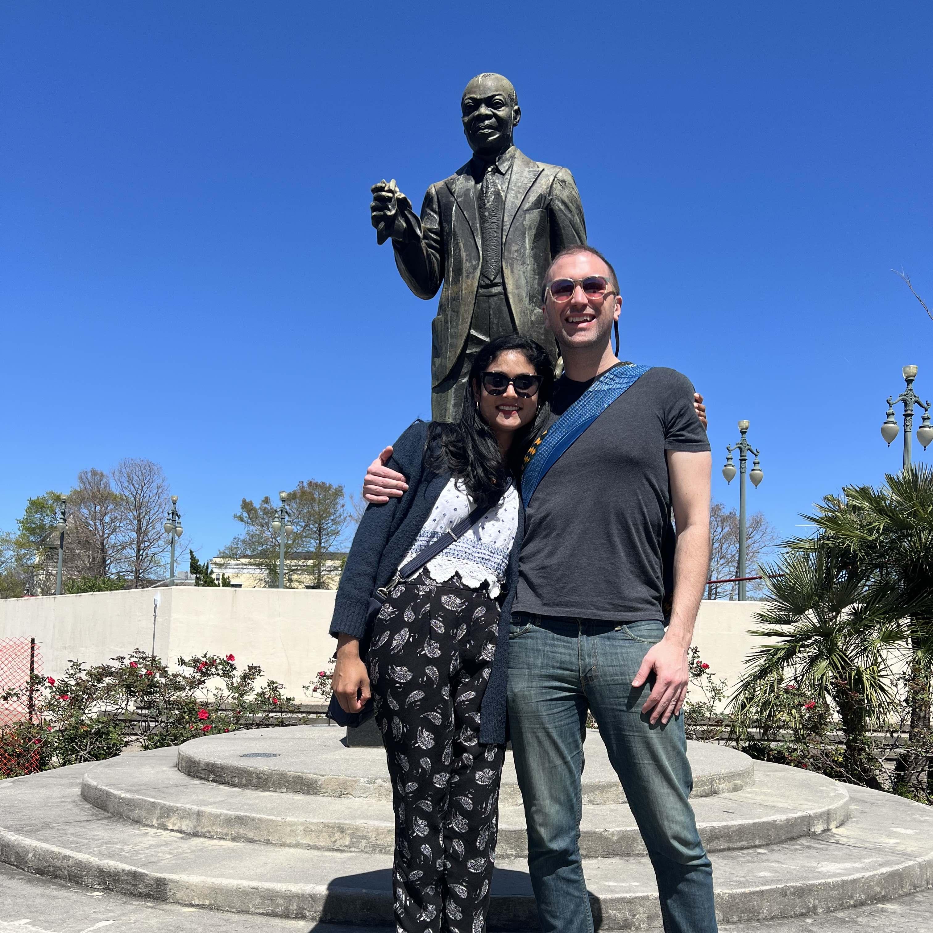 Louis Armstrong Park! Dan and Chands bought delicious greasy sandwiches from
a corner store in the French quarter and people watched before this picture was taken by a kind stranger.