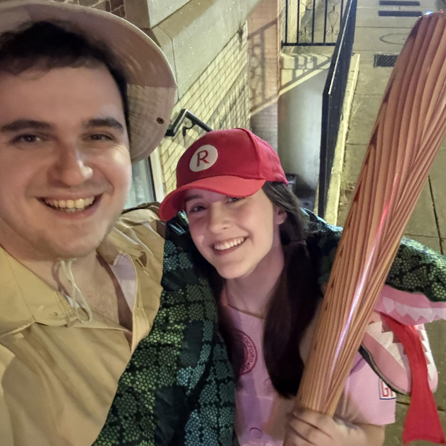 Halloween 2025-- Olivia as a League of Their Own baseball player, and Nate as a safari leader