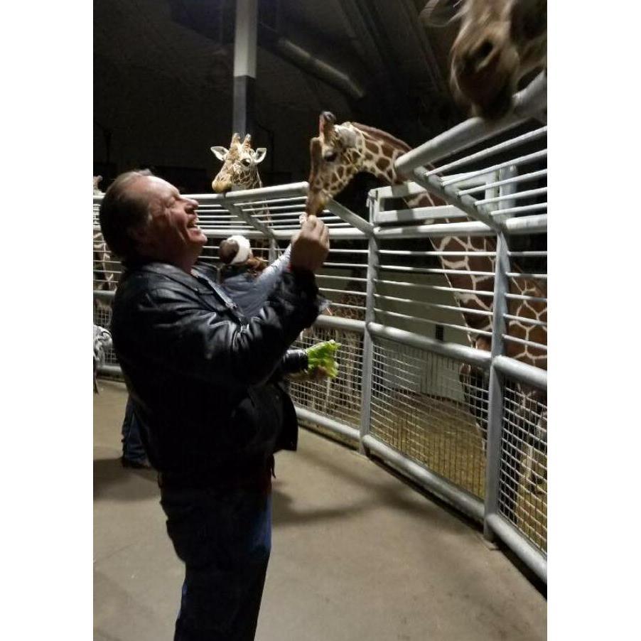 I think the giraffes were laughing at Wayne too!  Such a fun night...