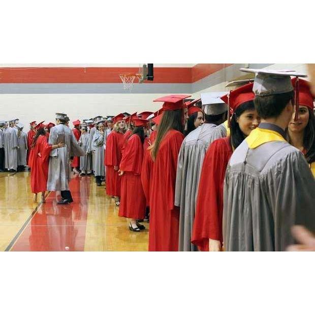 Our West Lafayette Jr/Sr High School graduation. Peep the 2 cuties walking arm in arm (thats us!), May 2011