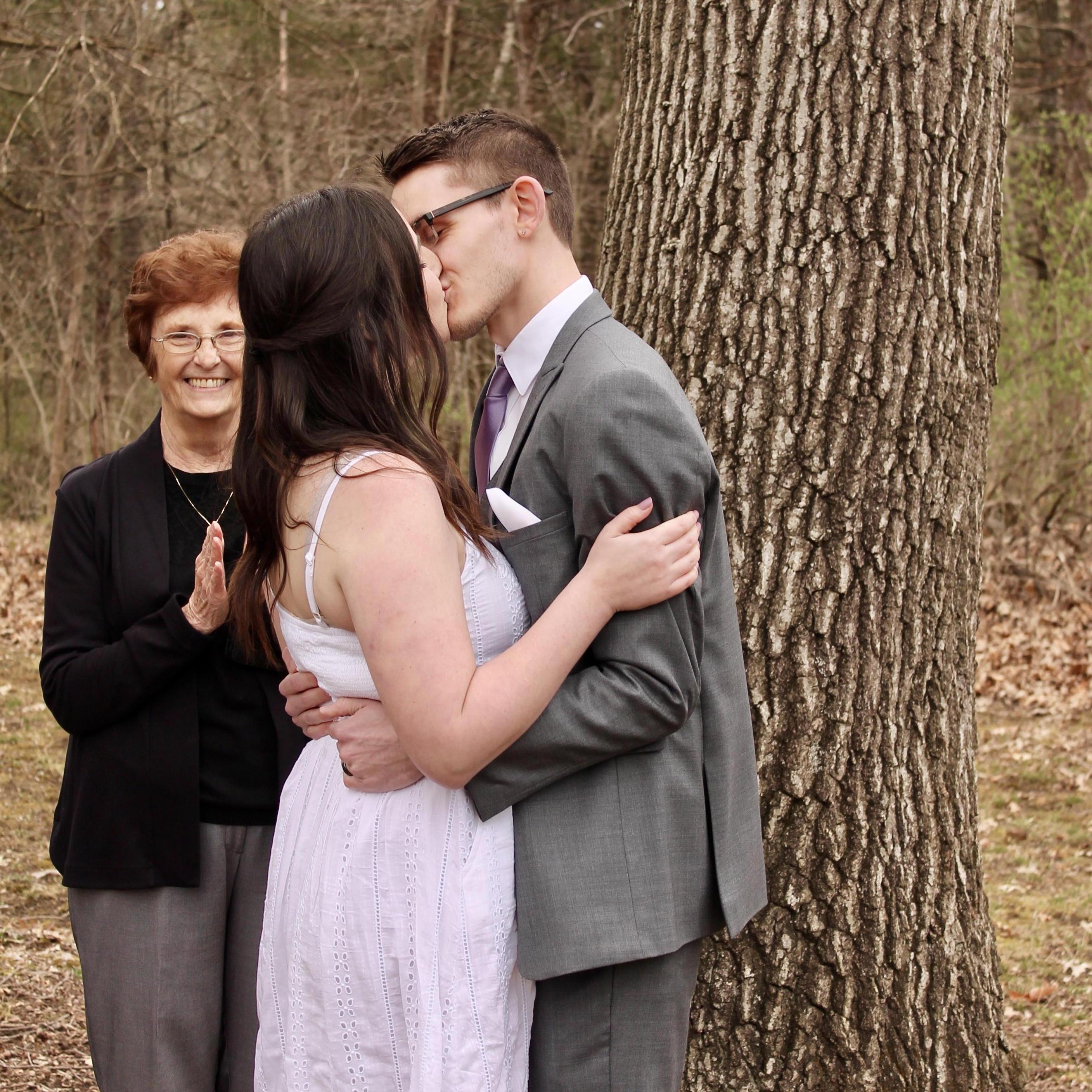 First kiss as husband and wife.