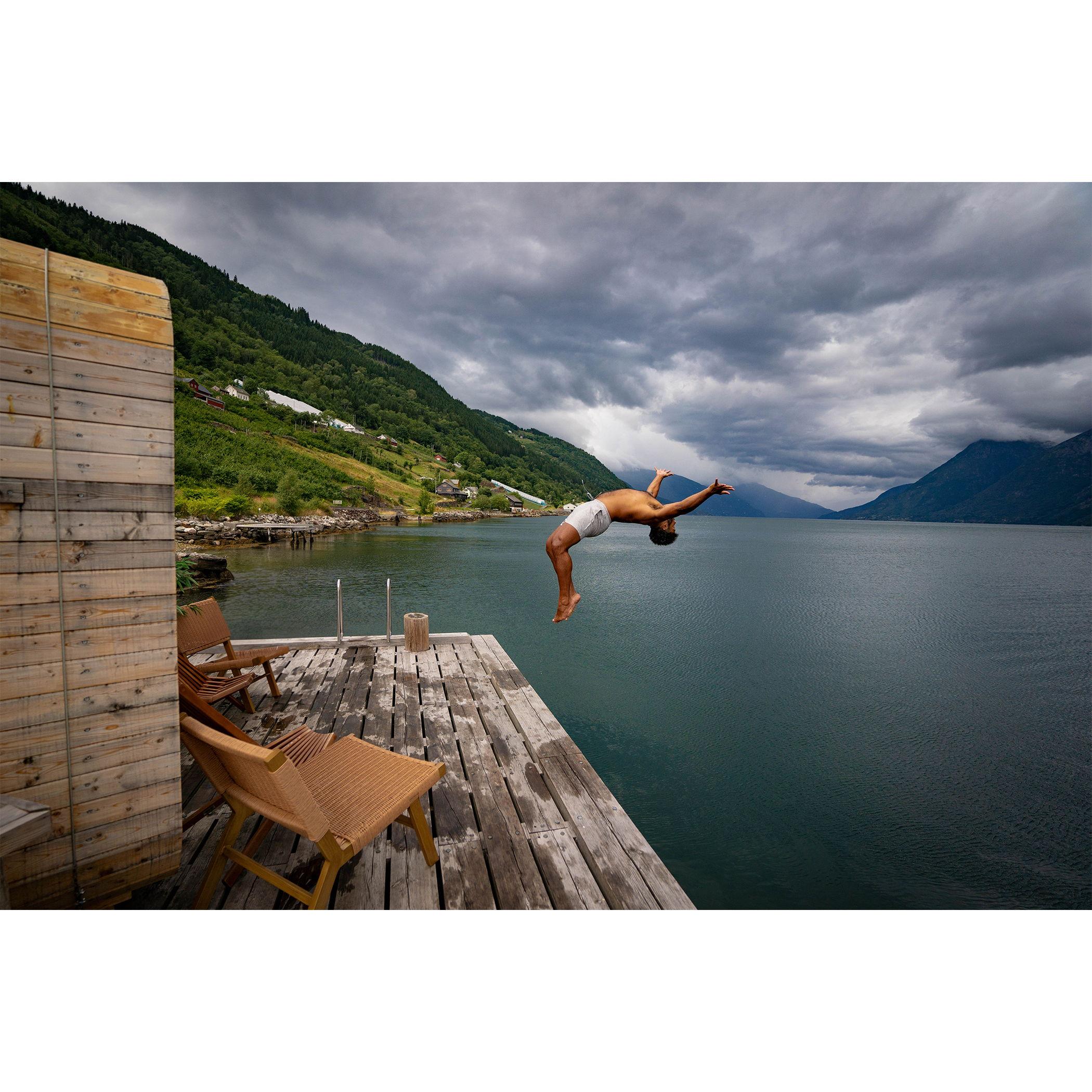 Alec doing a backflip off the dock in Norway