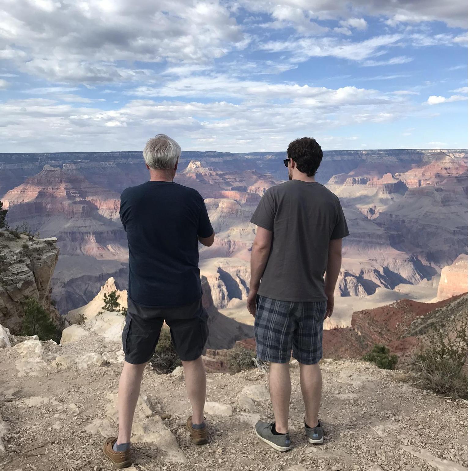 Ray and Emily's dad taking in the Grand Canyon during their cross country roadtrip to SF.