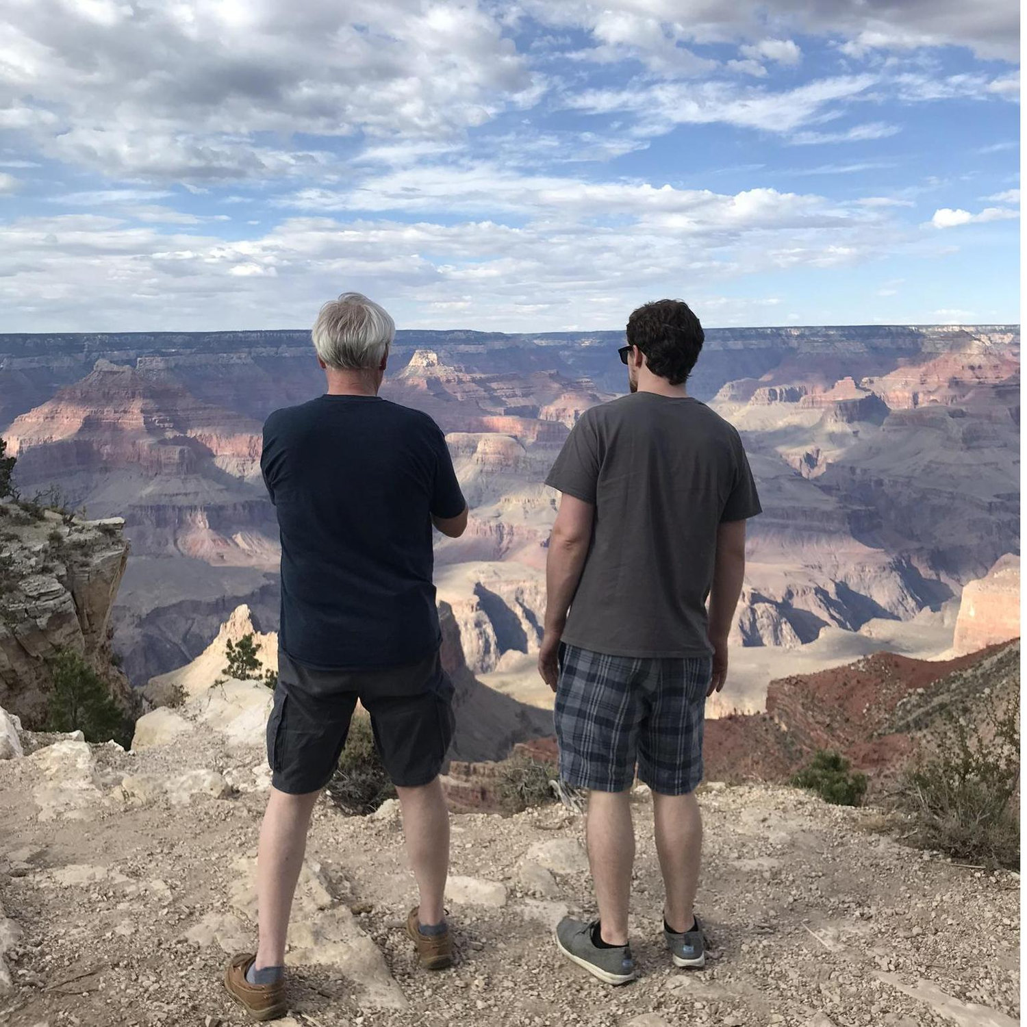 Ray and Emily's dad taking in the Grand Canyon during their cross country roadtrip to SF.