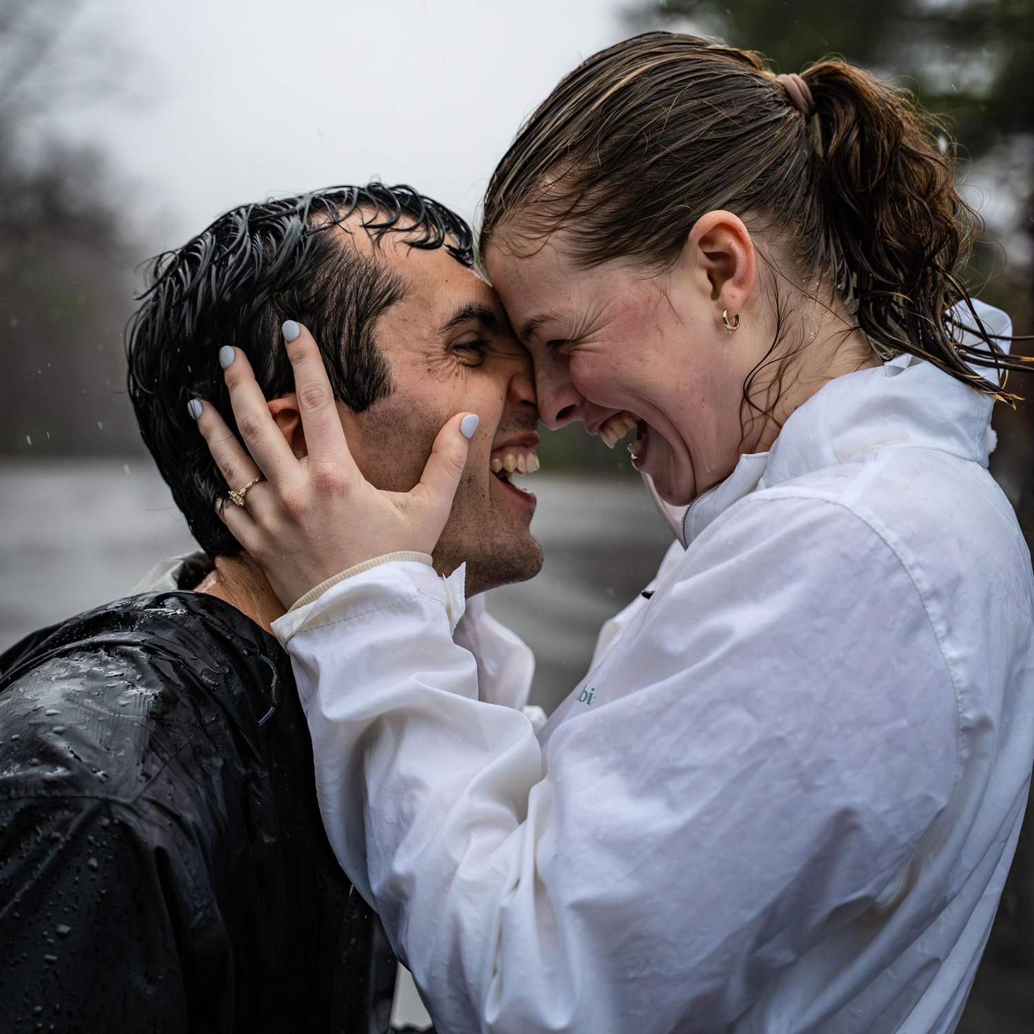 Scott proposed on the top of Hanging Rock State Park in the rain!
