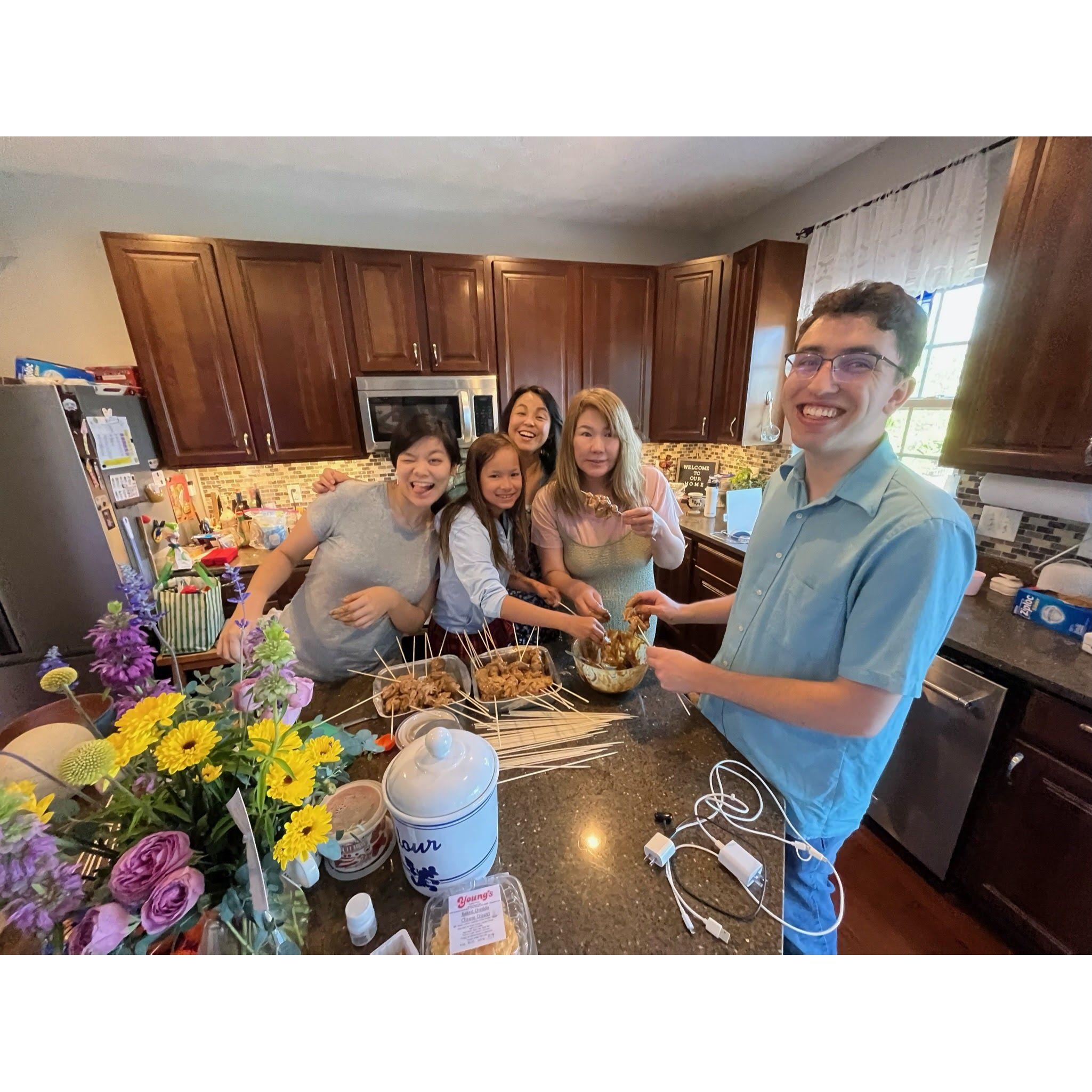 July 30, 2023 - Michael helping Josie's family make grilled chicken kebabs (while Josie stands behind the camera lol)