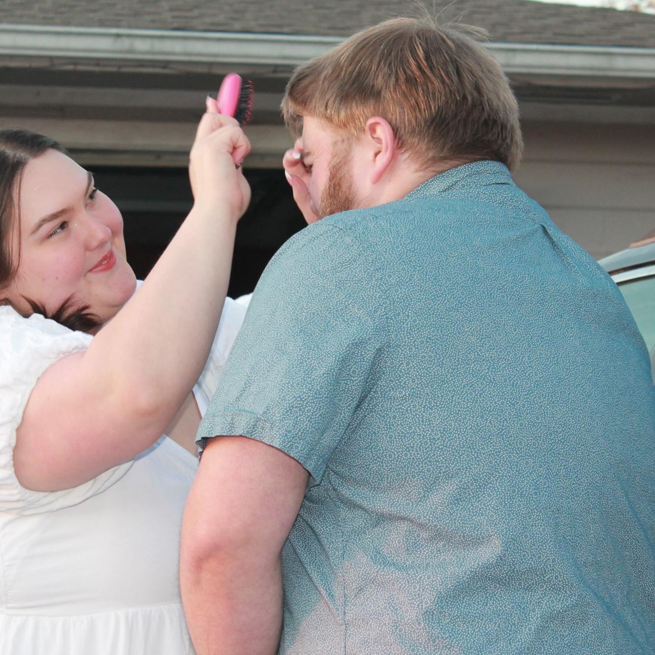 Getting Seth photo ready during our engagement shoot.