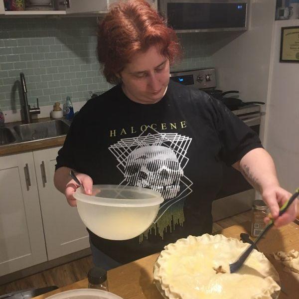 Stacie loves to bake goodies for people. Here she is getting an apple pie ready.