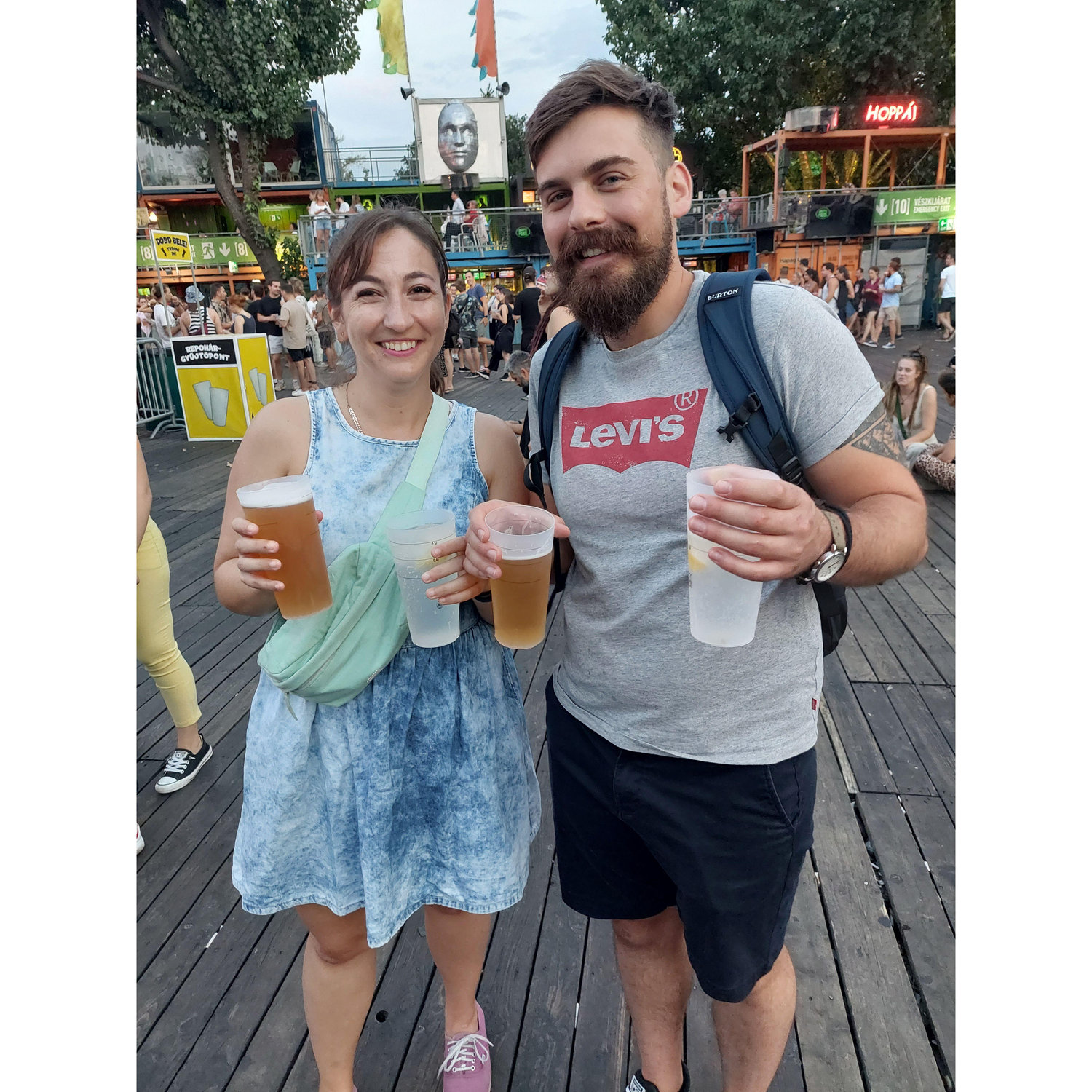 Meeting up at a concert and bringing a drink for the other not knowing they did the same.