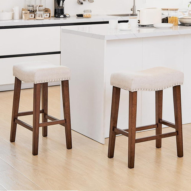 PrimeZone Counter Height Bar Stools Set of 2 - Backless Saddle Barstools with 4.3" Thick Upholstered, Nailhead Trim Linen Fabric & Solid Wood Legs, 24 Inch Counter Stools for Kitchen Island, Beige