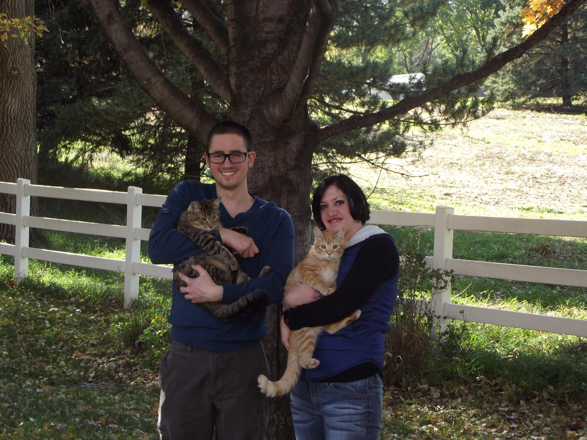Our little family, Connor holding Rudy and me holding Calvin