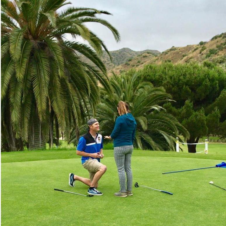 Adap popping the question on the golf course in Catalina Island!