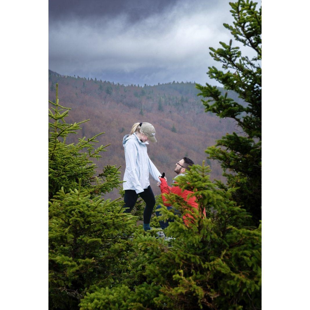 Aaron proposed to Julia on top of Stowe Pinnacle - he set up his tripod and took all of the photos himself!